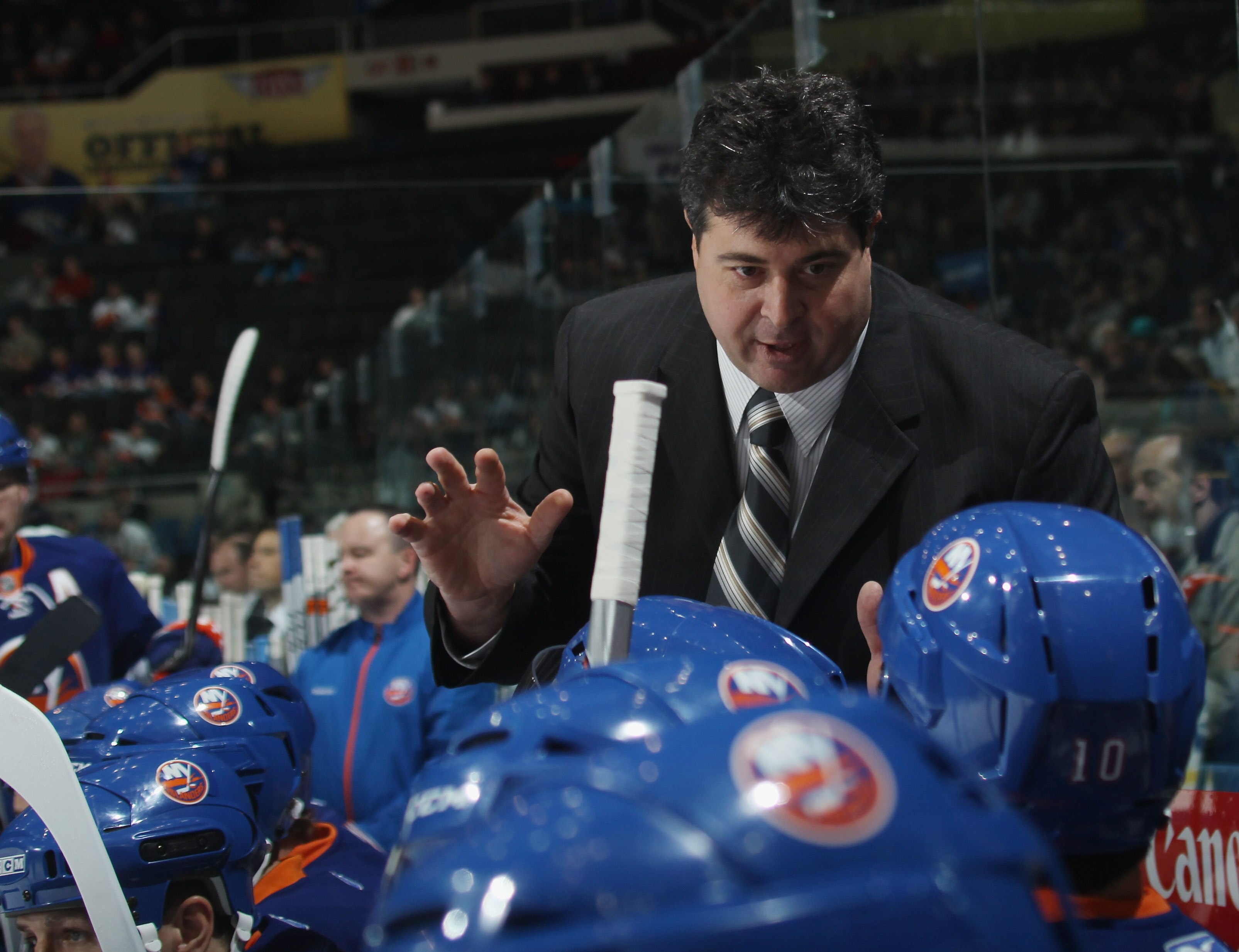 UNIONDALE, NY - NOVEMBER 17:  Head coach Jack Capuano of the New York Islanders works the bench during his first NHL game against the Tampa Bay Lightning at the Nassau Coliseum on November 17, 2010 in Uniondale, New York.  (Photo by Bruce Bennett/Getty Im