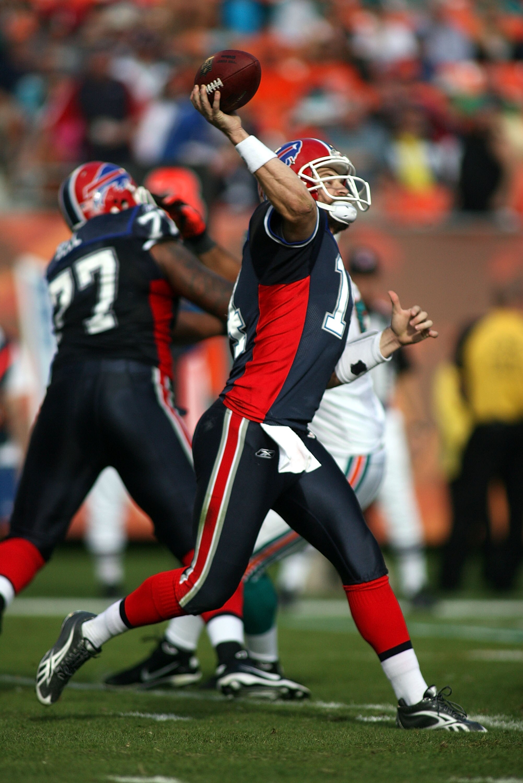 MIAMI - DECEMBER 19:  Quarterback Ryan Fitzpatrick #14 of the Buffalo Bills throws against the Miami Dolphins at Sun Life Stadium on December 19, 2010 in Miami, Florida.The Bills defeated the Dolphins 17-14.  (Photo by Marc Serota/Getty Images)