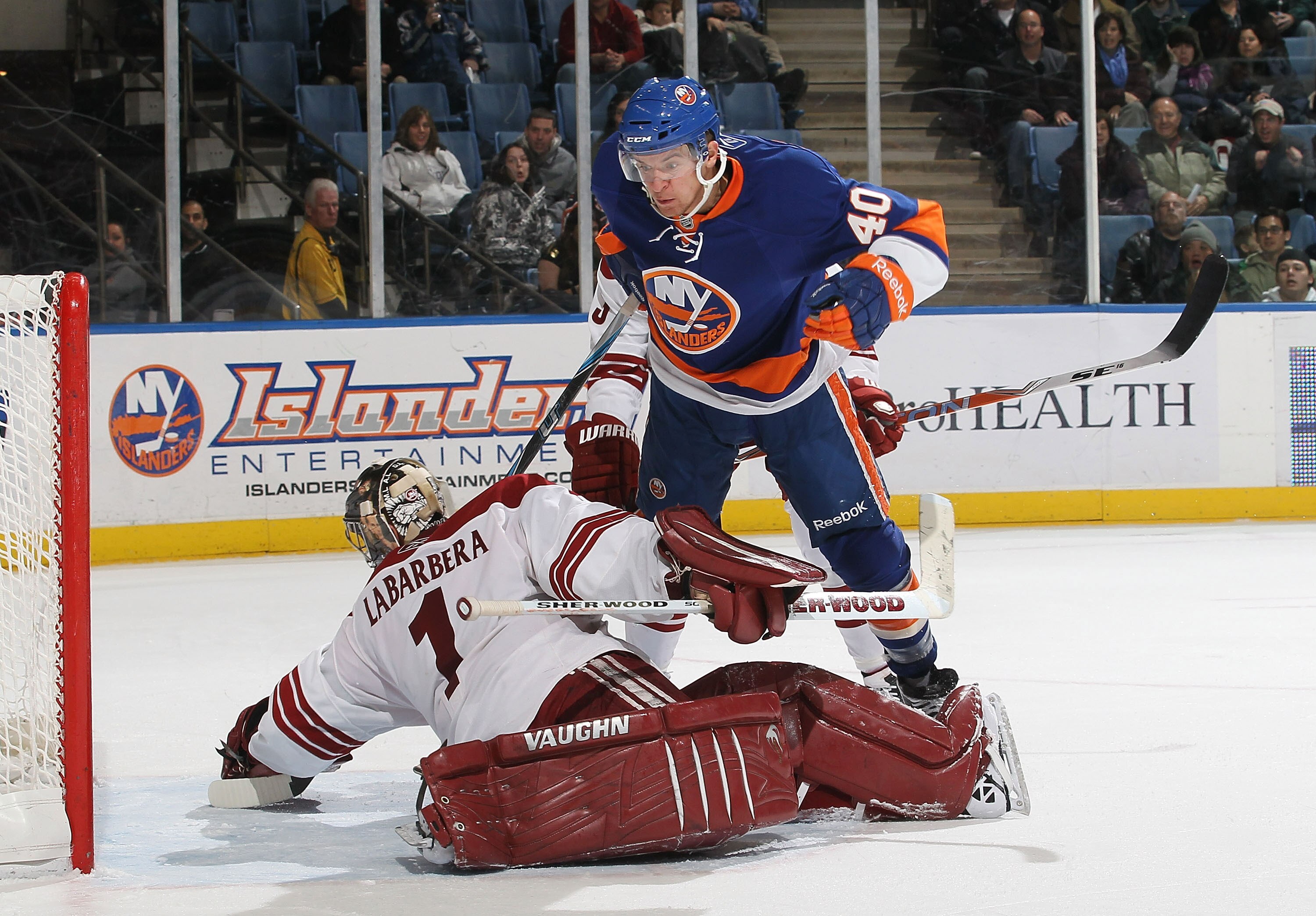 UNIONDALE, NY - DECEMBER 18: Michael Grabner #40 of the New York Islanders scores a goal against Jason LaBarbera #1 of the Phoenix Coyotes during their game on December 18, 2010 at the Nassau Coliseum in Uniondale, New York.  (Photo by Al Bello/Getty Imag