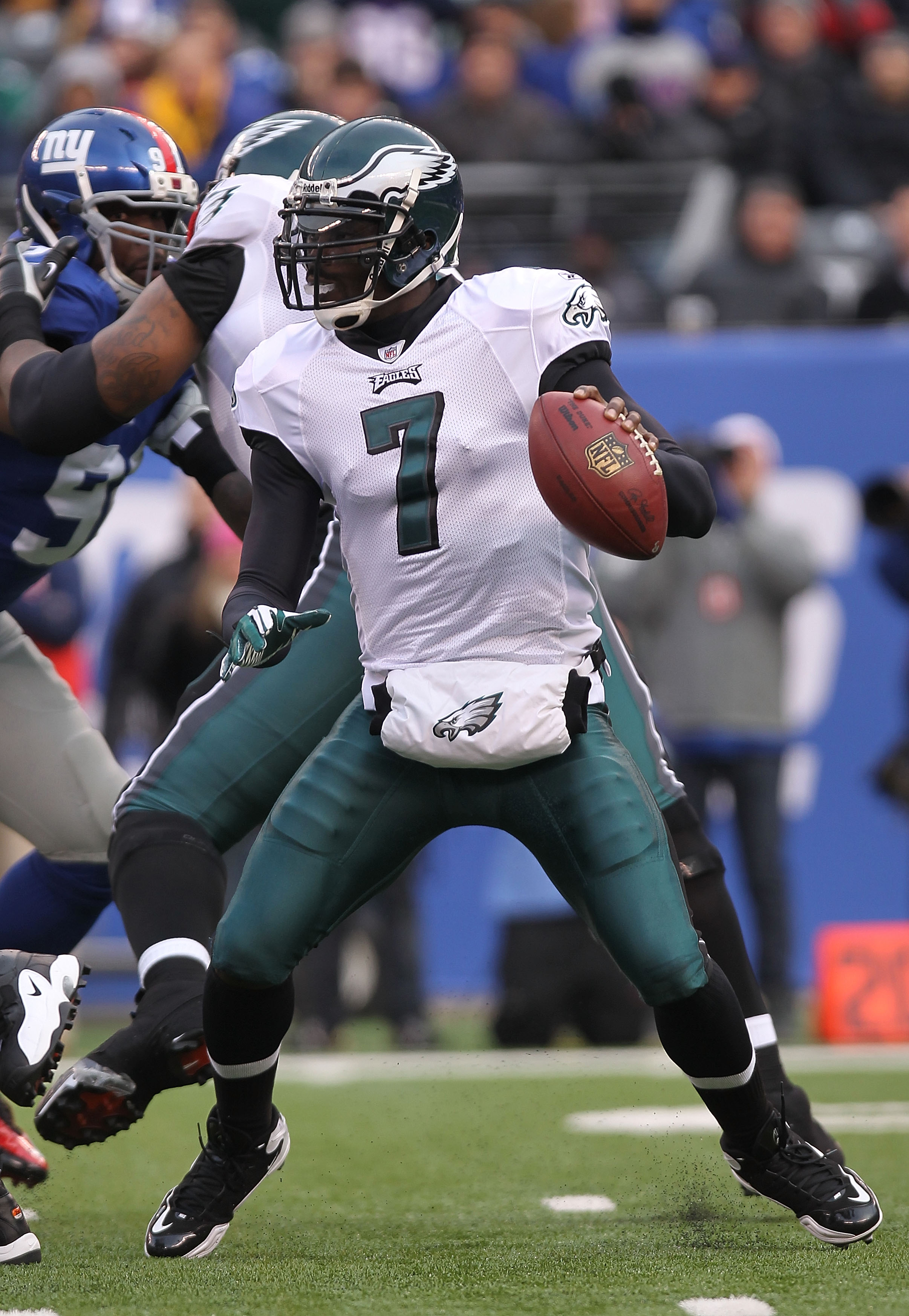 EAST RUTHERFORD, NJ - DECEMBER 19:  Michael Vick #7 of the Philadelphia Eagles against the New York Giants at New Meadowlands Stadium on December 19, 2010 in East Rutherford, New Jersey.  (Photo by Nick Laham/Getty Images)