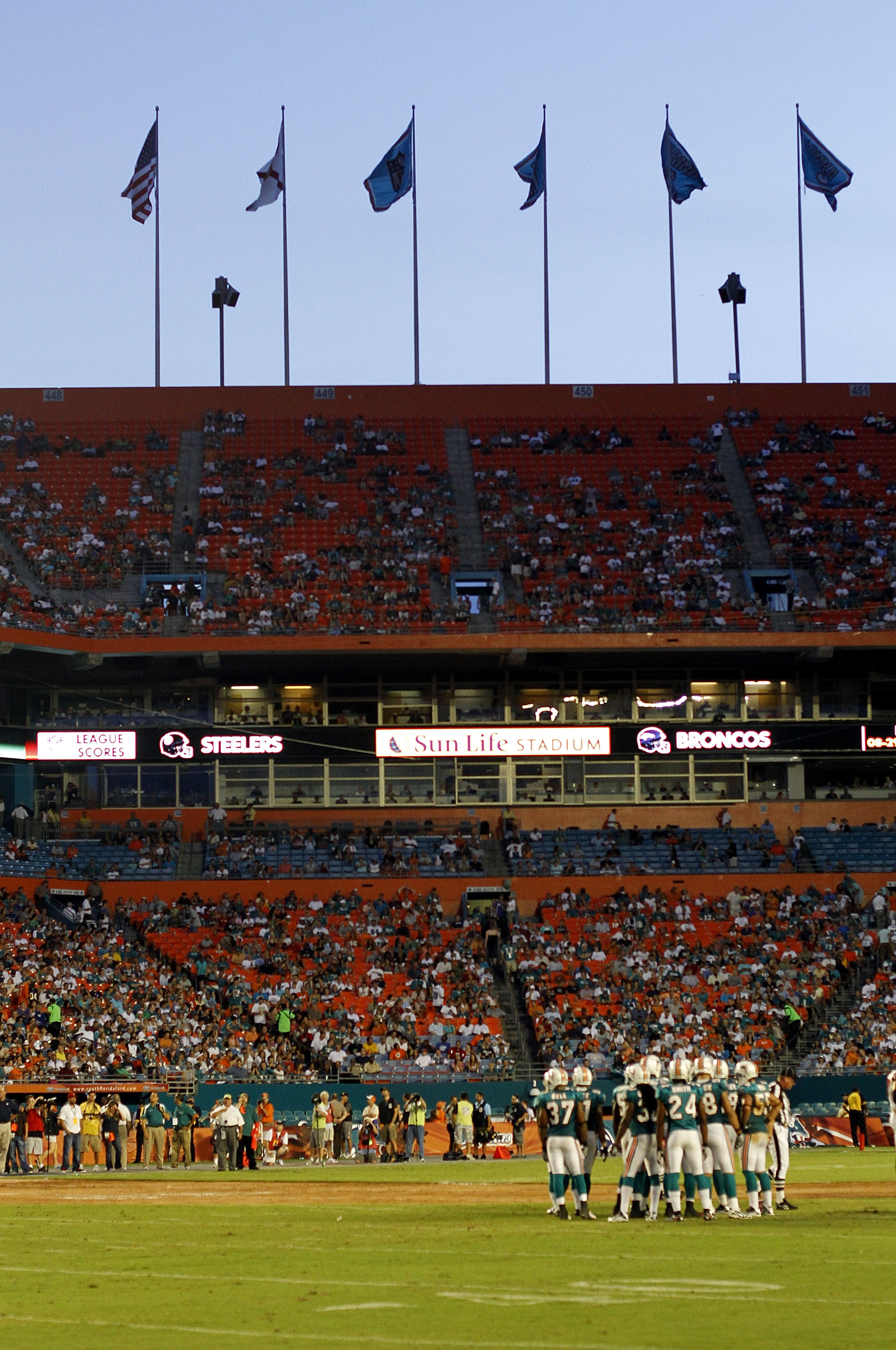 MIAMI - AUGUST 27:  The Miami Dolphins huddle up against the Atlanta Falcons during preseason action at Sun Life Stadium on August 27, 2010 in Miami, Florida.  (Photo by Marc Serota/Getty Images)