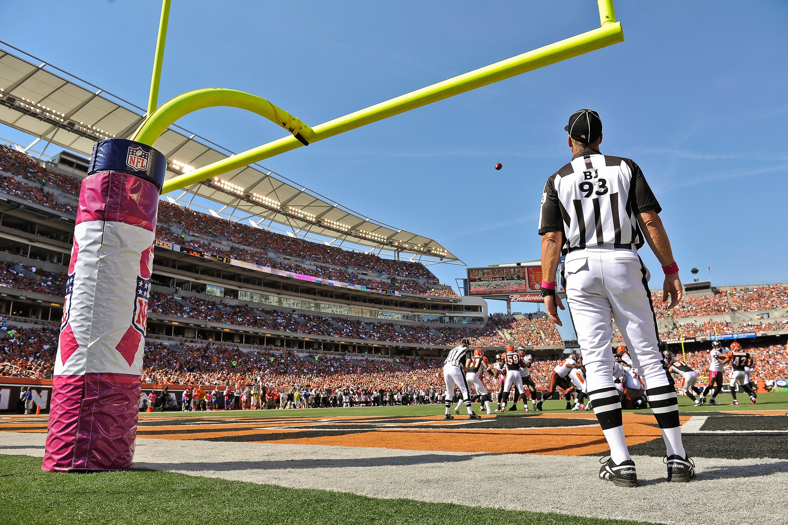 CINCINNATI, OH - OCTOBER 10: Back Judge Scott Helverson #93 watches an extra point attempt by the Tampa Bay Buccaneers during a game against the Cincinnati Bengals at Paul Brown Stadium on October 10, 2010 in Cincinnati, Ohio. (Photo by Jamie Sabau/Getty