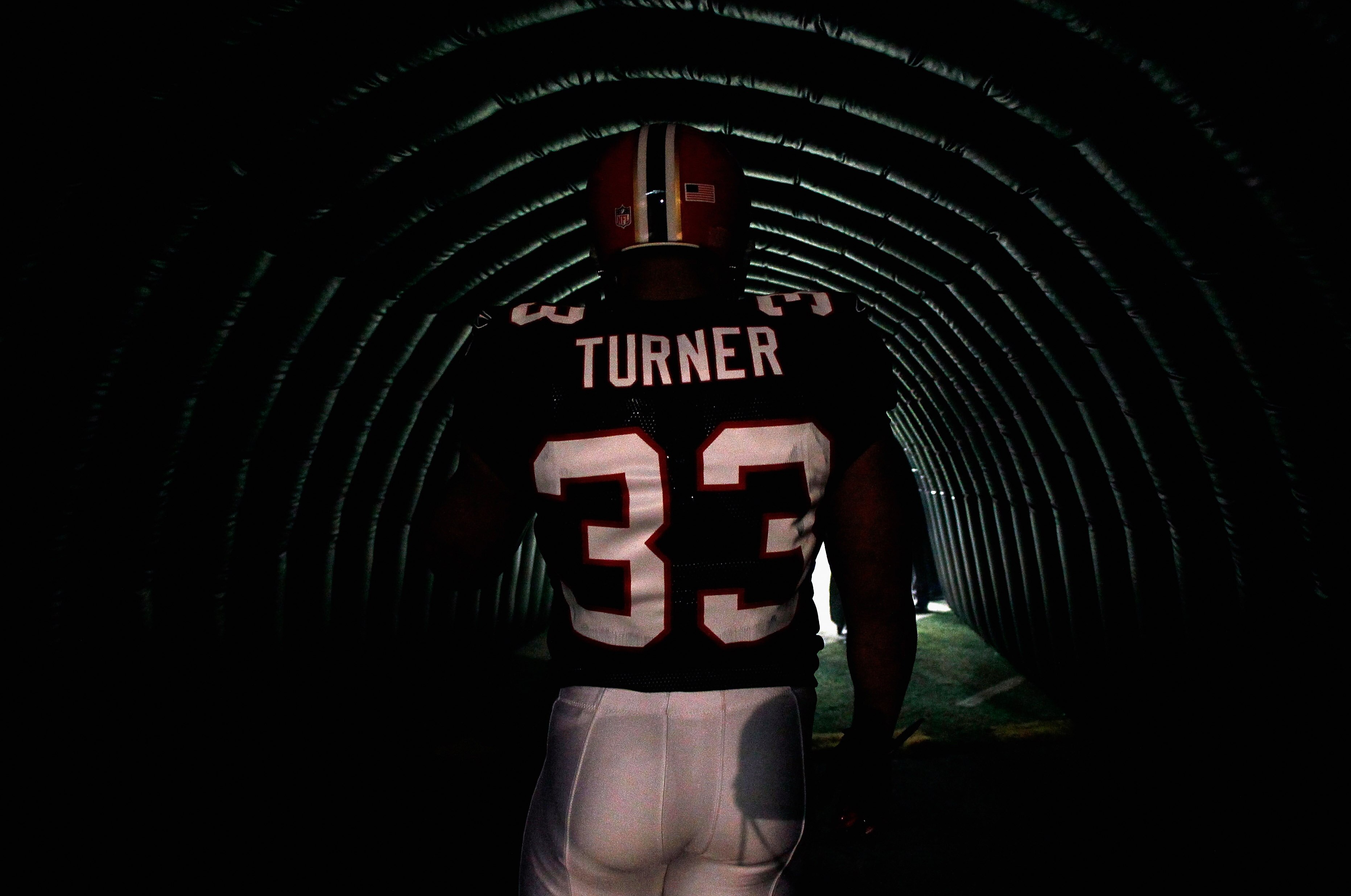 ATLANTA - NOVEMBER 11:  Michael Turner #33 of the Atlanta Falcons waits to enter the field during player introductions before facing the Baltimore Ravens at Georgia Dome on November 11, 2010 in Atlanta, Georgia.  (Photo by Kevin C. Cox/Getty Images)