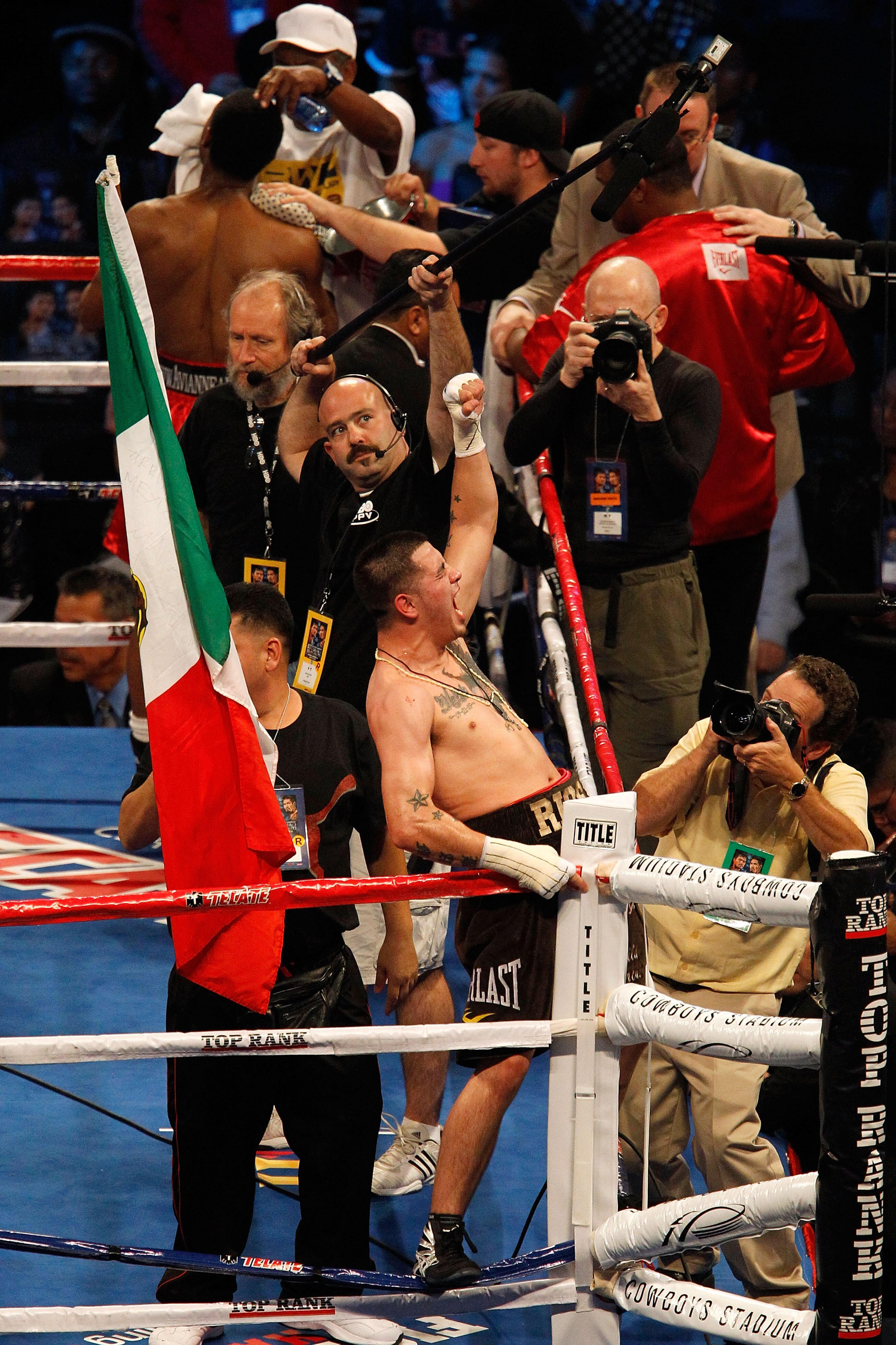 ARLINGTON, TX - NOVEMBER 13:  Brandon Rios (brown trunks) celebrates after he won his match against Omri Lowther during their Super Lightweight bout at Cowboys Stadium on November 13, 2010 in Arlington, Texas.  (Photo by Tom Pennington/Getty Images)