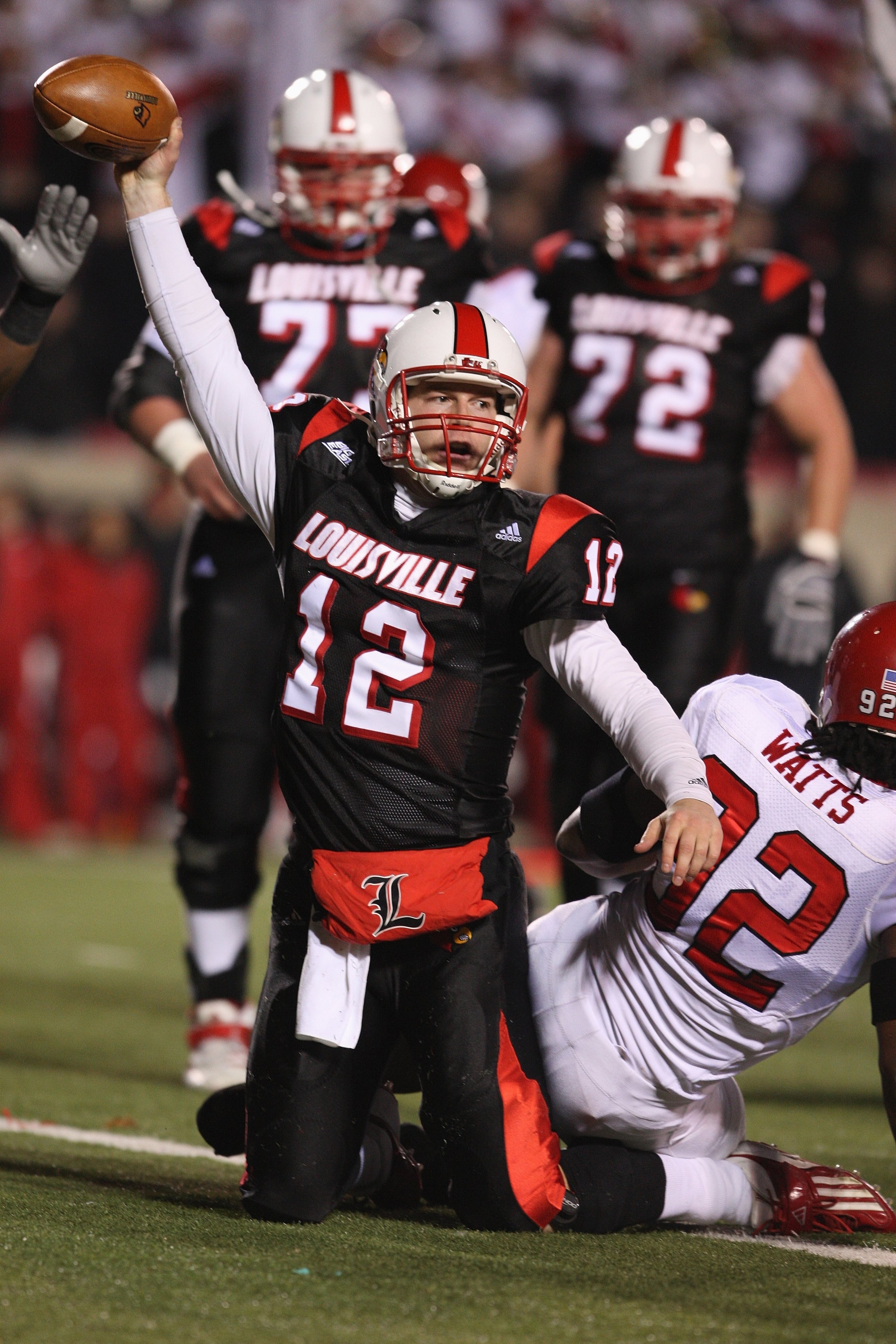 LOUISVILLE, KY - NOVEMBER 29:  Brian Brohm #12 of the Louisville Cardinals celebrates after scoring a touchdown during the Big East Conference game against the Rutgers Scarlet Knights on November 29, 2007 at Papa John's Stadium. (Photo by Andy Lyons/Getty