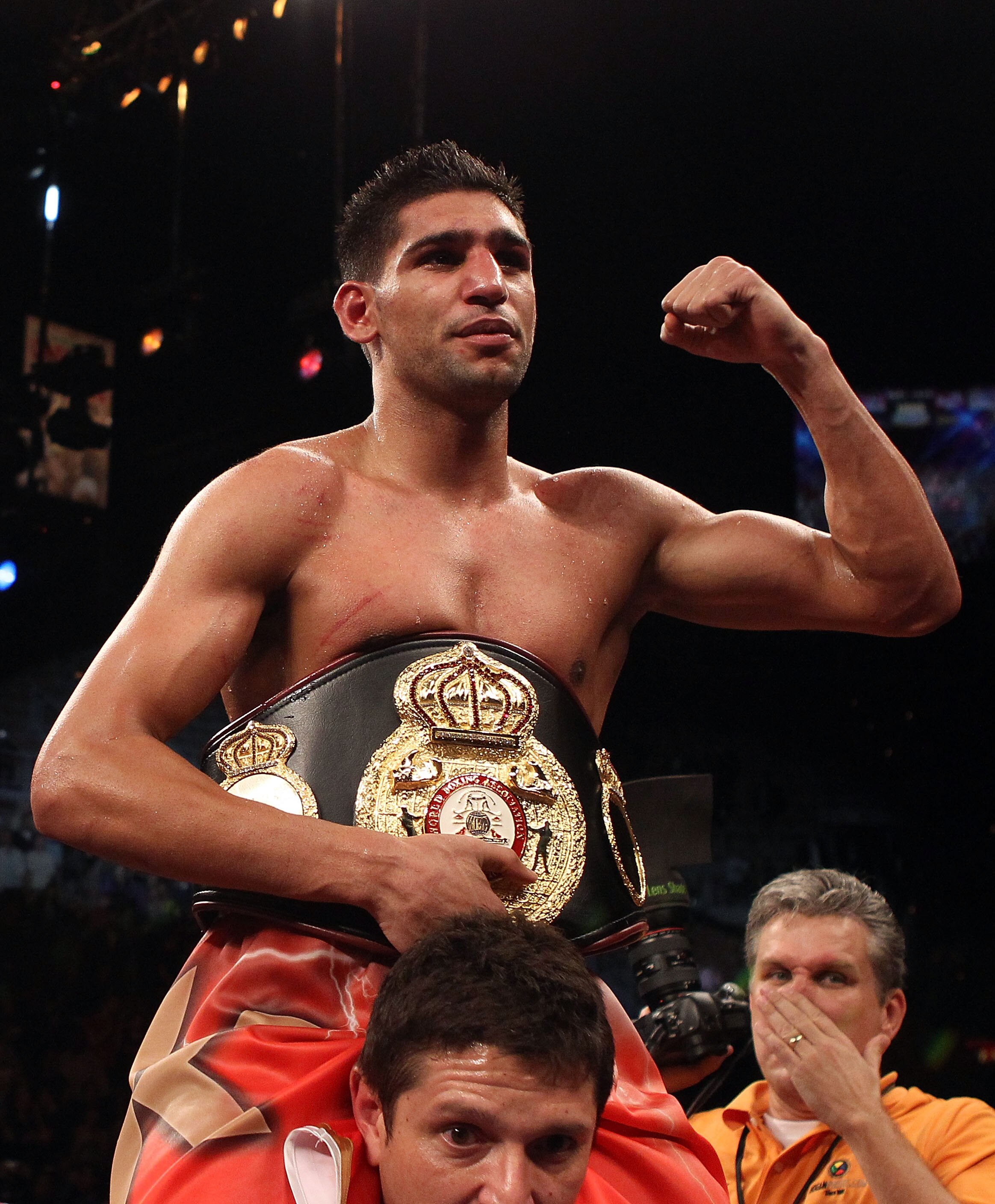 LAS VEGAS - DECEMBER 11:  Amir Khan of England celebrates after his unanimous decision victory against Marcos Maidana of Argentina after their WBA super lightweight title fight at Mandalay Bay Events Center on December 11, 2010 in Las Vegas, Nevada.  (Pho
