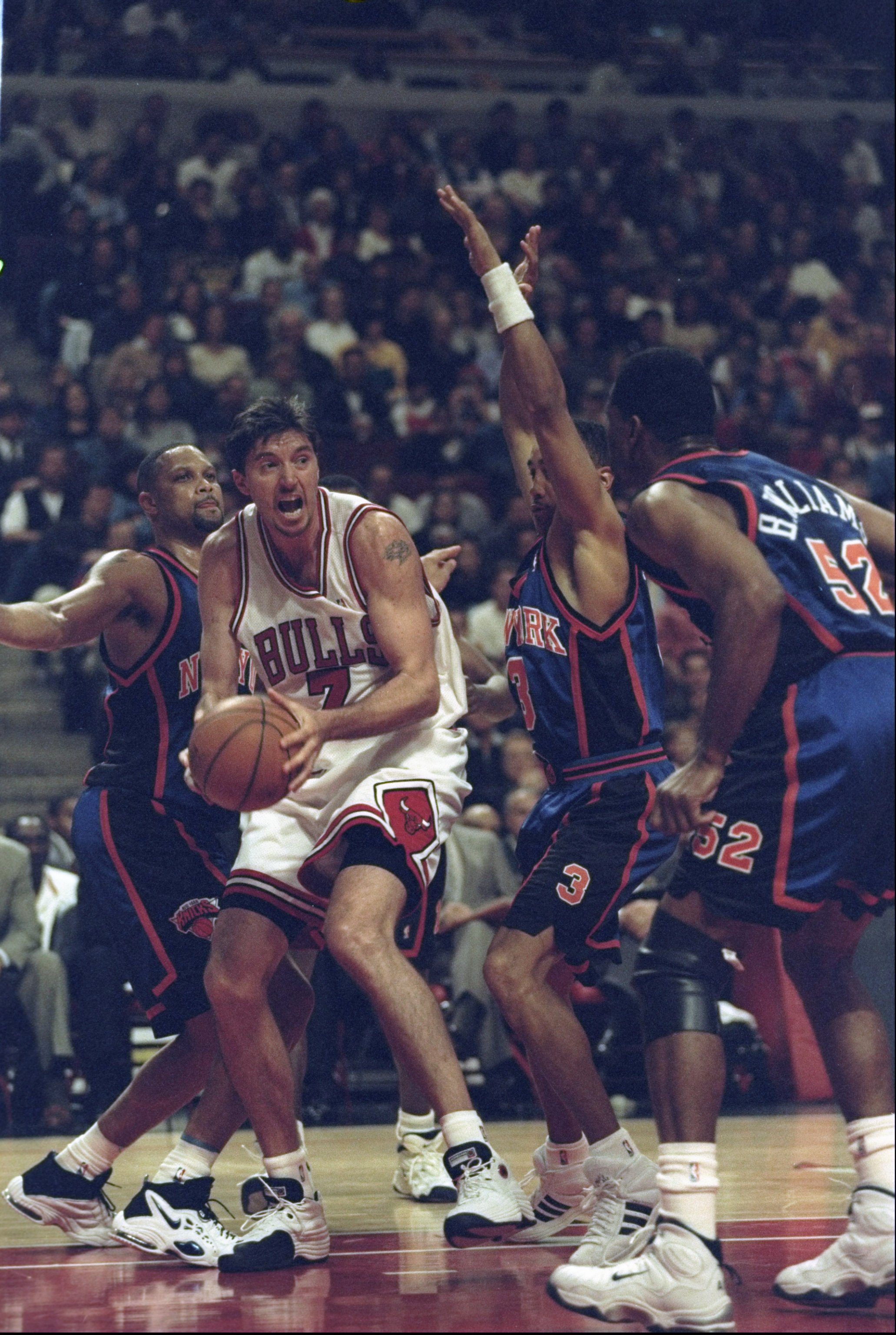 18 Apr 1998:  Toni Kukoc of the Chicago Bulls is guarded by John Starks #3 and Buck Williams #52 of the New York Knicks during a  game at the United Center in Chicago, Illinois. The Bulls defeated the Knicks 111-109. Mandatory Credit: Jonathan Daniel  /Al