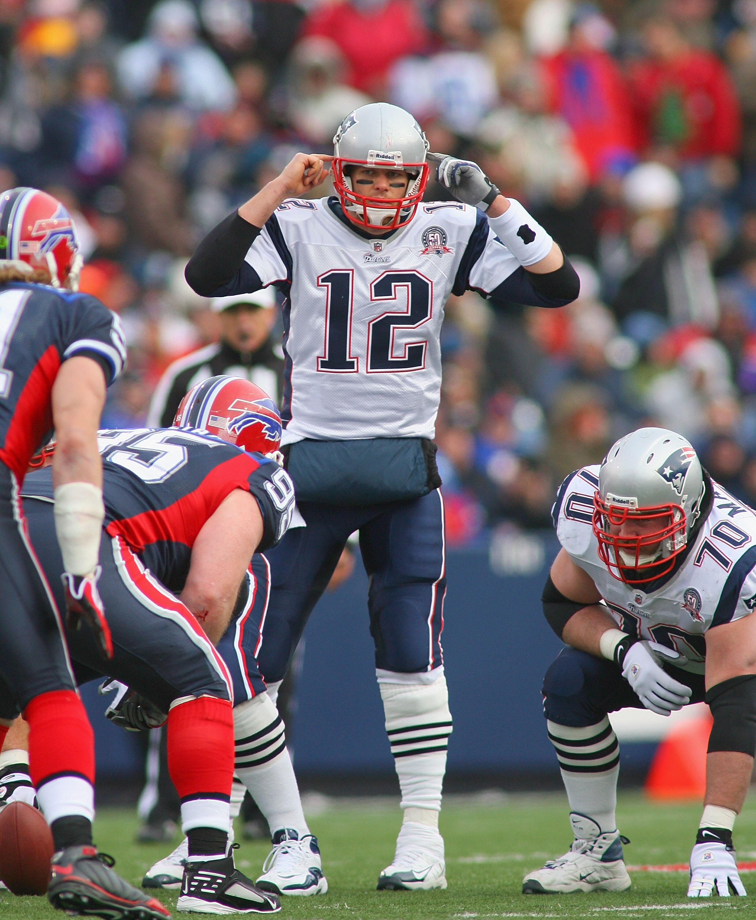 ORCHARD PARK, NY - DECEMBER 20: Tom Brady #12 of the New England Patriots calls signals against the Buffalo Bills  at Ralph Wilson Stadium on December 20, 2009 in Orchard Park, New York.  (Photo by Rick Stewart/Getty Images)