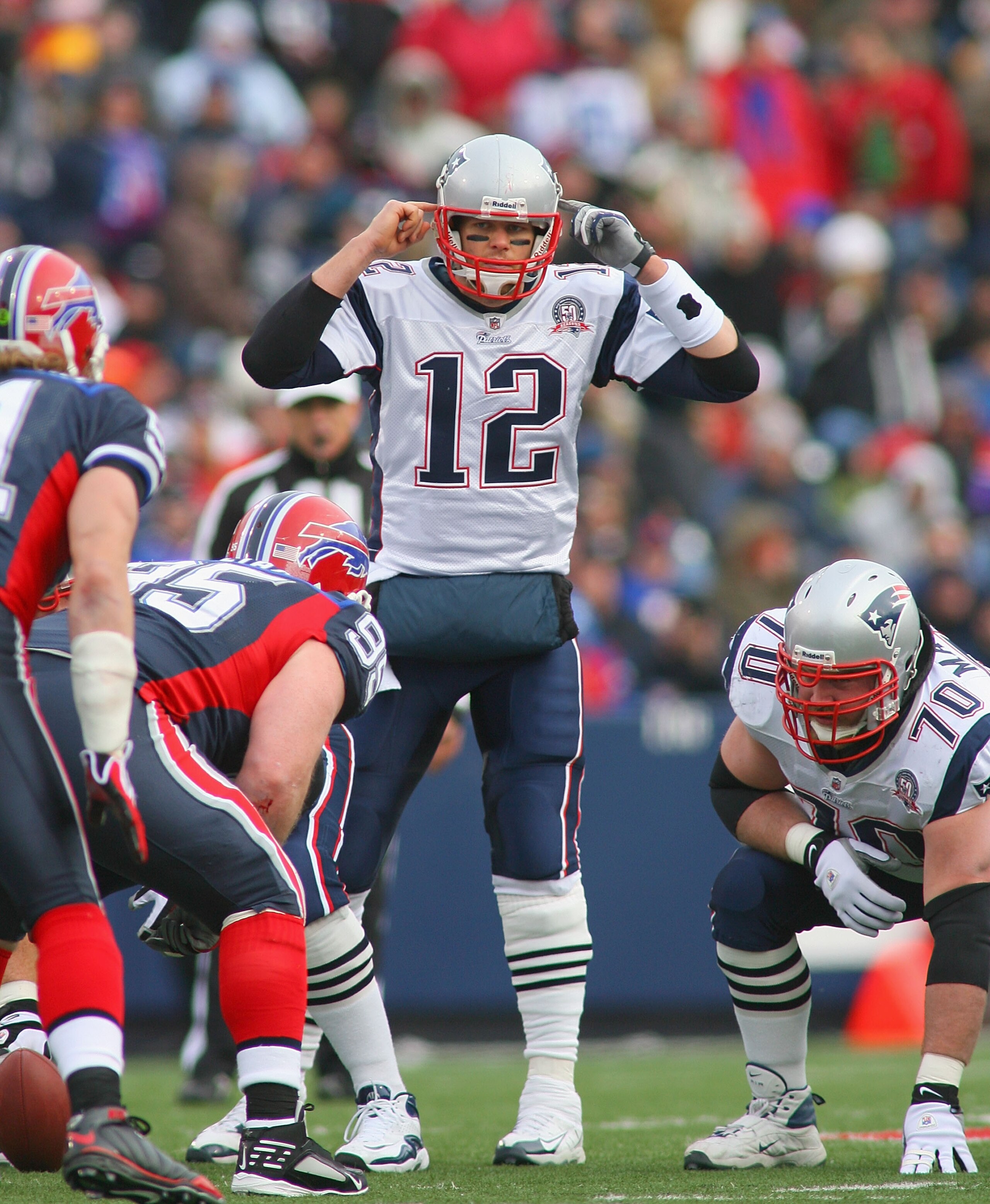 ORCHARD PARK, NY - DECEMBER 20: Tom Brady #12 of the New England Patriots calls signals against the Buffalo Bills  at Ralph Wilson Stadium on December 20, 2009 in Orchard Park, New York.  (Photo by Rick Stewart/Getty Images)