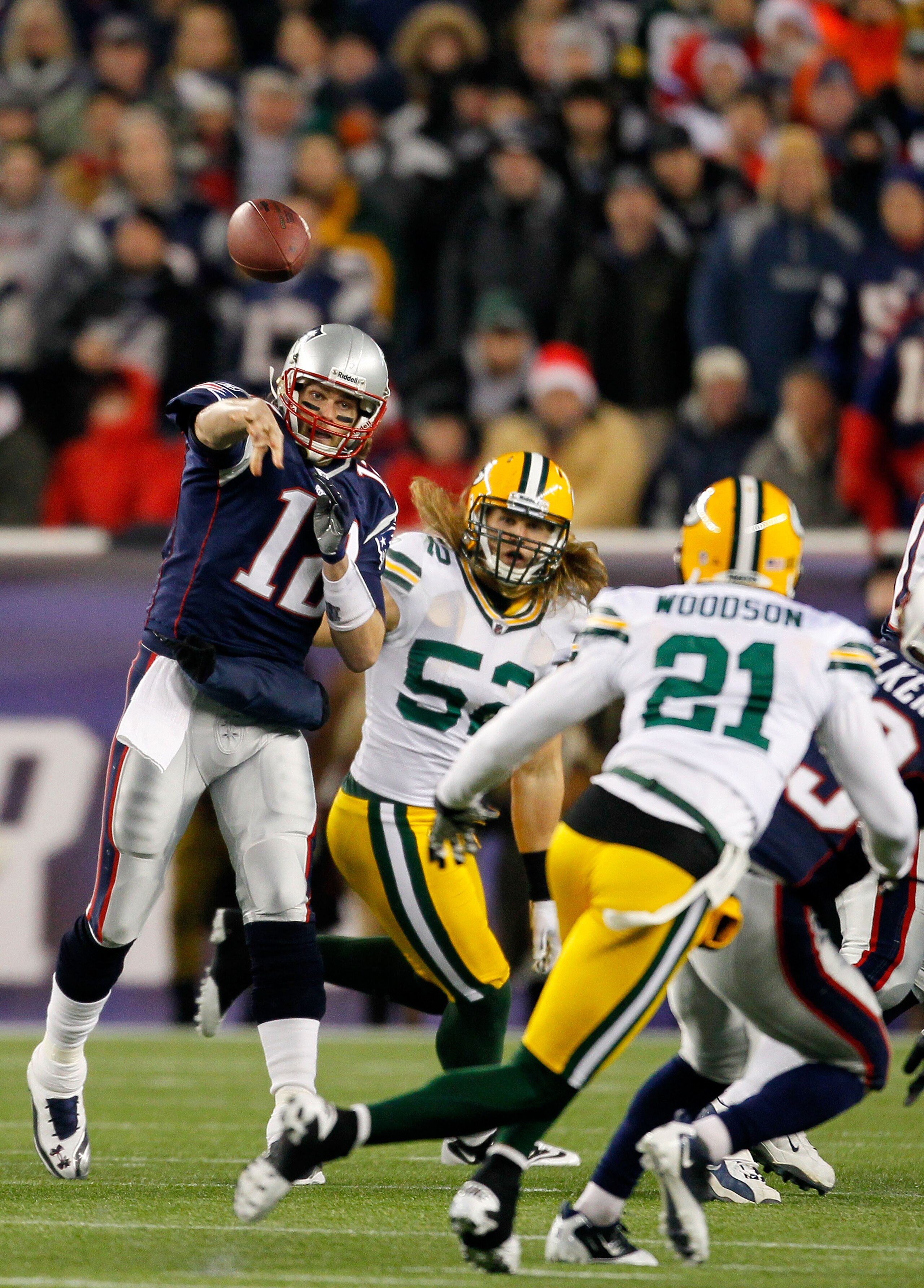 FOXBORO, MA - DECEMBER 19:  Quarterback Tom Brady #12 of the New England Patriots throws a pass against the Green Bay Packers in the first quarter of the game at Gillette Stadium on December 19, 2010 in Foxboro, Massachusetts.  (Photo by Jim Rogash/Getty