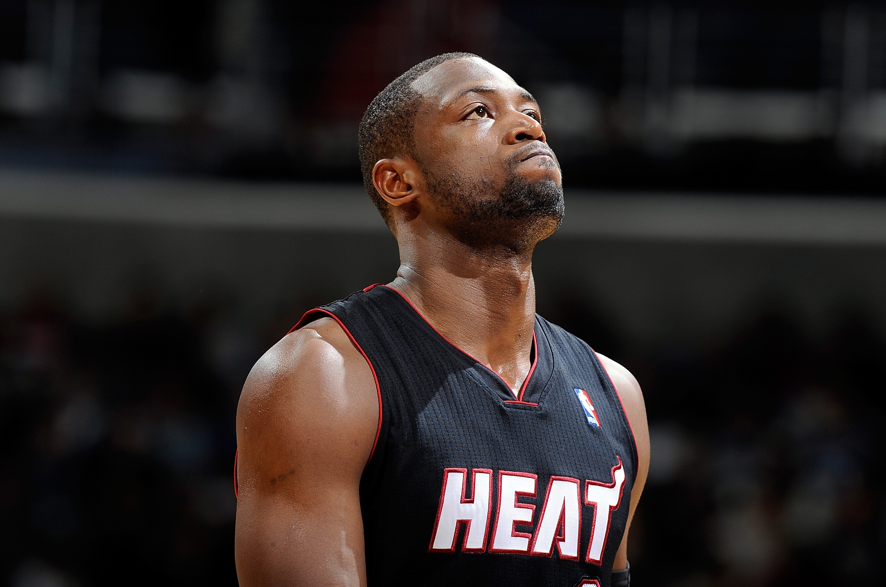 WASHINGTON, DC - DECEMBER 18:  Dwyane Wade #3 of the Miami Heat rests during a break in the game against the Washington Wizards at the Verizon Center on December 18, 2010 in Washington, DC. NOTE TO USER: User expressly acknowledges and agrees that, by dow