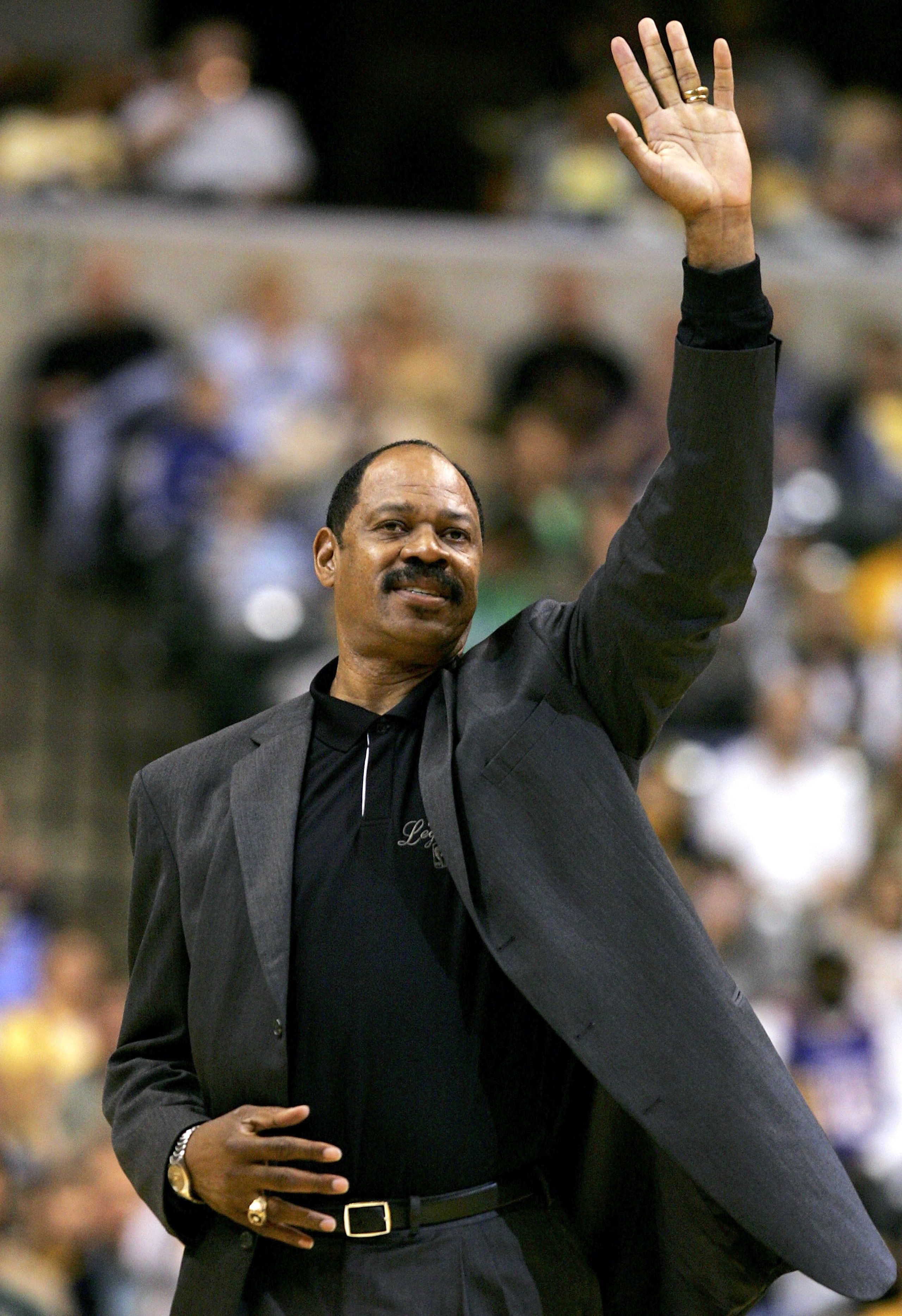 INDIANAPOLIS - APRIL 29: Former NBA player Artis Gilmore acknowledges the crowd after being introduced during a timeout between the Indiana Pacers and the New Jersey Nets in game four of the Eastern Conference Quarterfinals during the 2006 NBA playoffs o INDIANAPOLIS - APRIL 29: Former NBA player Artis Gilmore acknowledges the crowd after being introduced during a timeout between the Indiana Pacers and the New Jersey Nets in game four of the Eastern Conference Quarterfinals during the 2006 NBA playoffs o