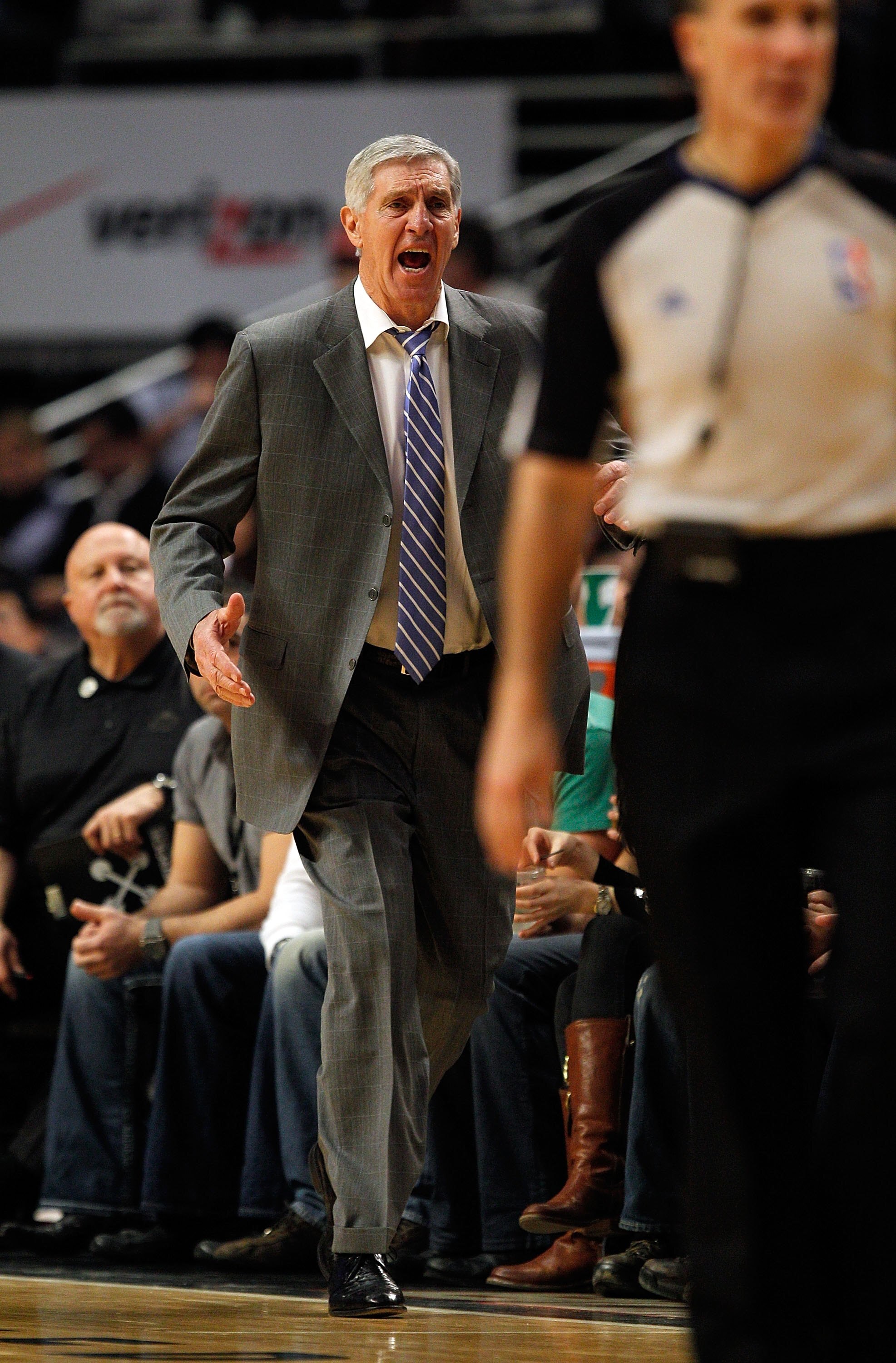 CHICAGO - MARCH 09: Head coach Jerry Sloan of the Utah Jazz complains to a referee during a game against the Chicago Bulls at the United Center on March 9, 2010 in Chicago, Illinois. The Jazz defeated the Bulls 132-108. NOTE TO USER: User expressly acknow