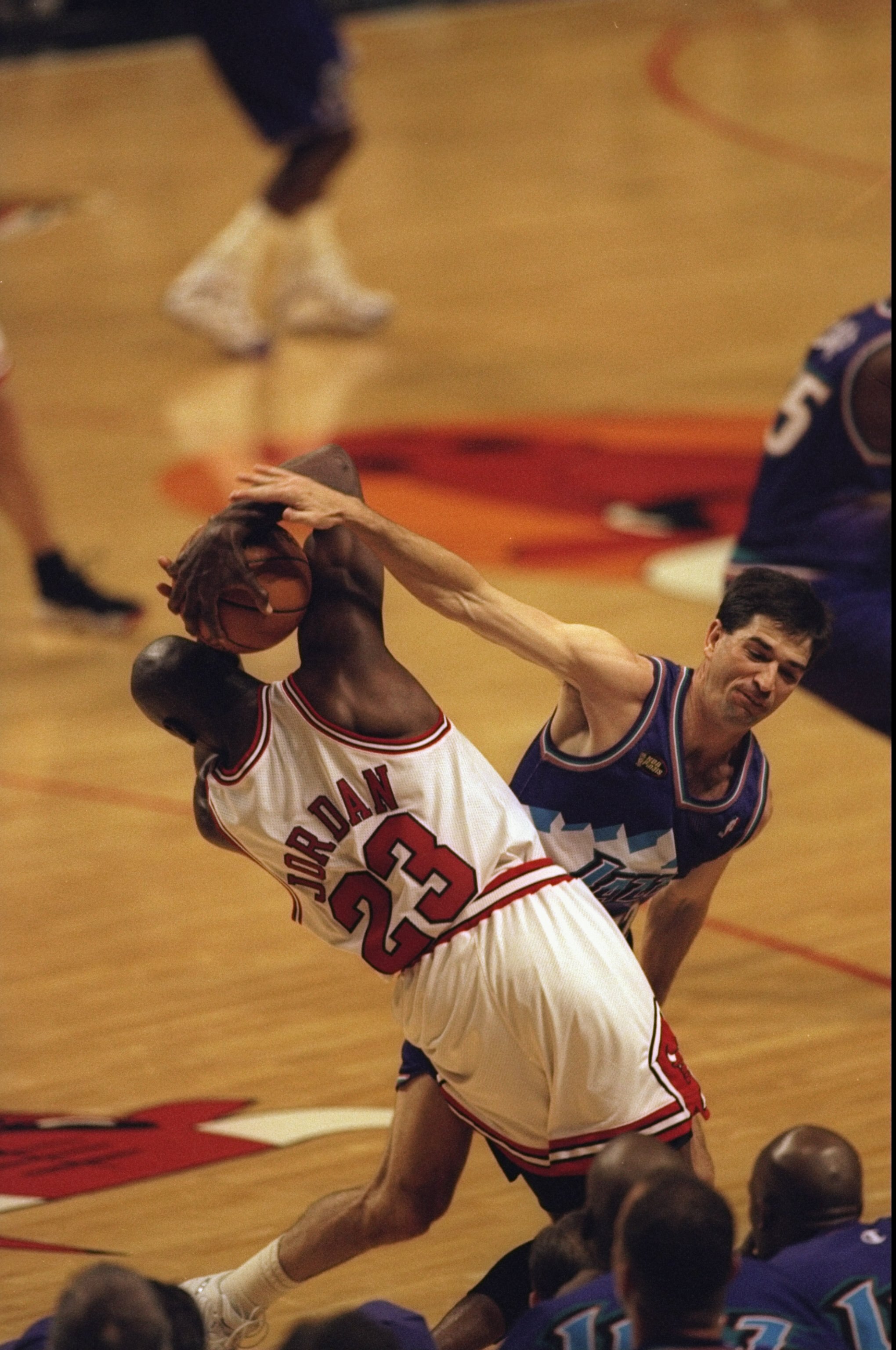 7 Jun 1998:  Michael Jordan #23 of the Chicago Bulls guards the ball  from John Stockton #12 of the Utah Jazz during the NBA Finals game 3 at the United Center in Chicago, Illinois.  The Bulls defeated the Jazz 96-54. Mandatory Credit: Jonathan Daniel  /A