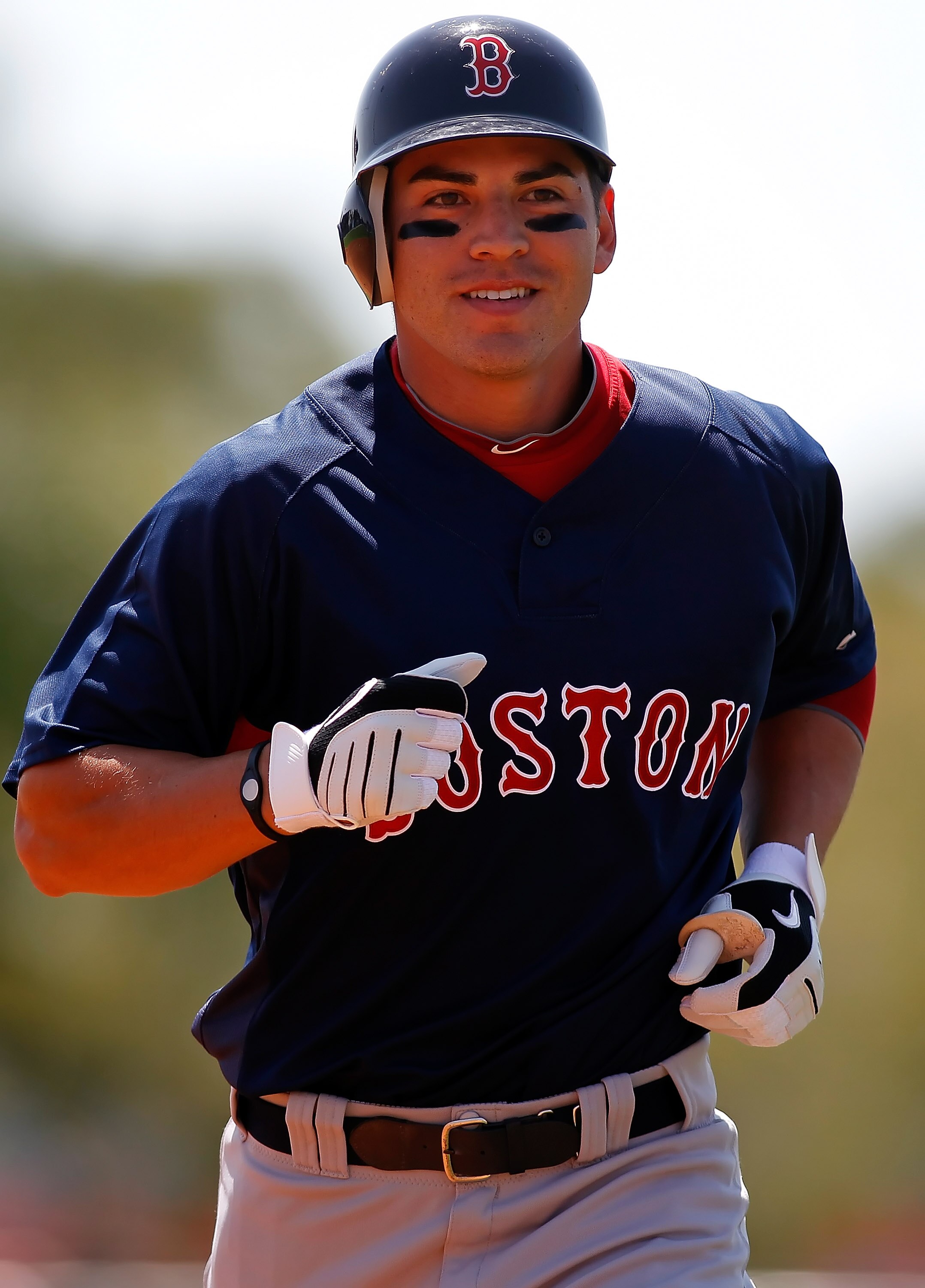 SARASOTA, FL - MARCH 27:  Outfielder Jacoby Ellsbury #2 of the Boston Red Sox  jogs back to the dugout after the inning against the Baltimore Orioles during a Grapefruit League Spring Training Game at Ed Smith Stadium on March 27, 2010 in Sarasota, Florid