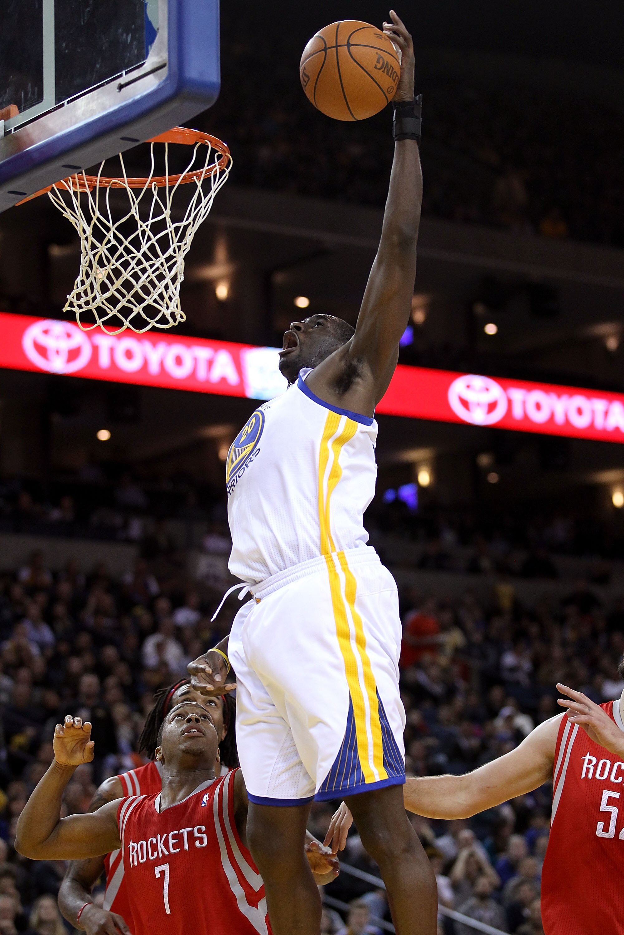 OAKLAND, CA - DECEMBER 20:  Ekpe Udoh #20 of the Golden State Warriors dunks the ball during their game against the Houston Rockets at Oracle Arena on December 20, 2010 in Oakland, California. NOTE TO USER: User expressly acknowledges and agrees that, by