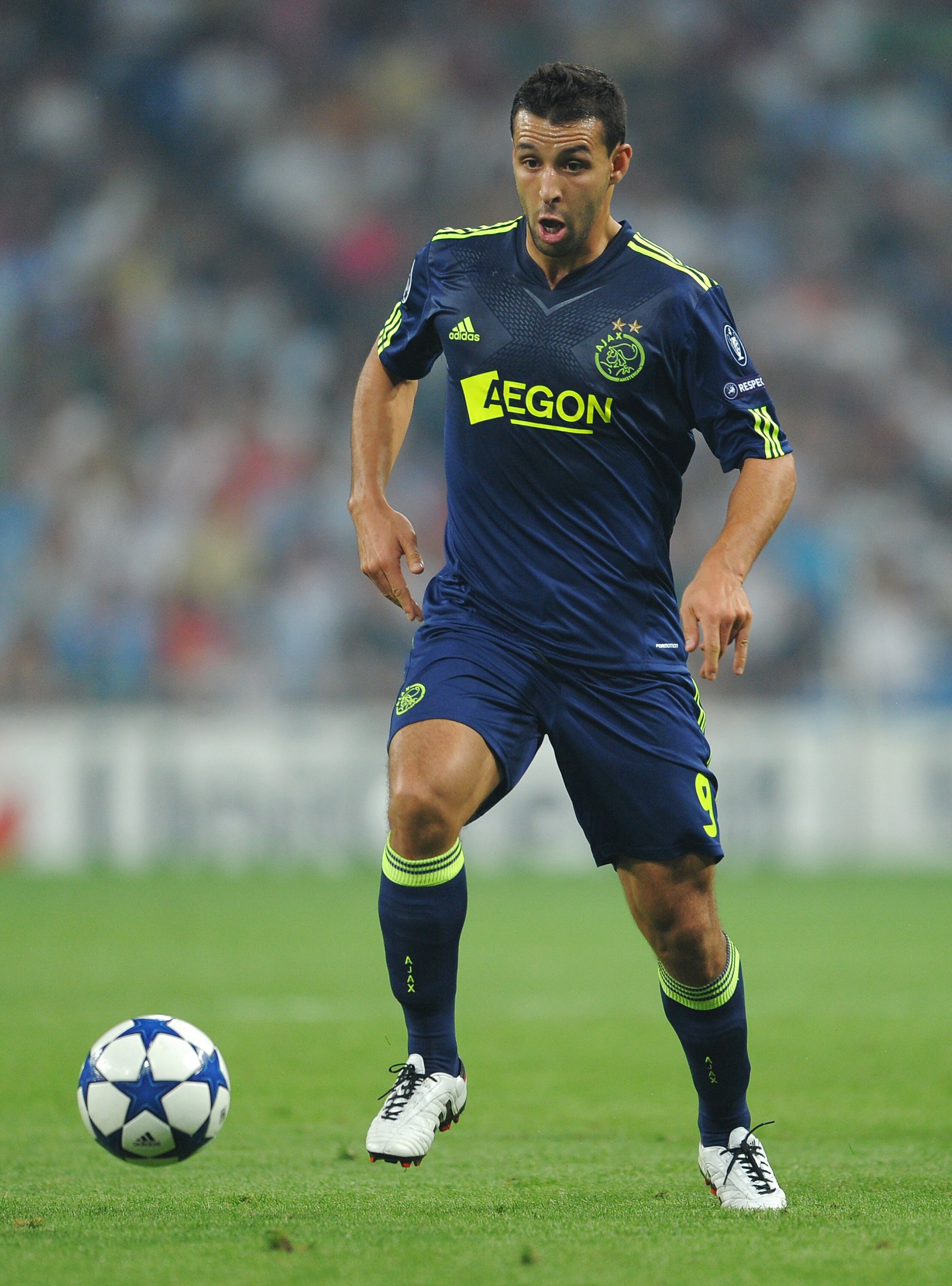 MADRID, SPAIN - SEPTEMBER 15:  Mounir El Hamdaoui of Ajax controls the ball during the UEFA Champions League group G match between Real Madrid and Ajax at the Estadio Santiago Bernabeu on September 15, 2010 in Madrid, Spain. Real Madrid won the match 2-0.