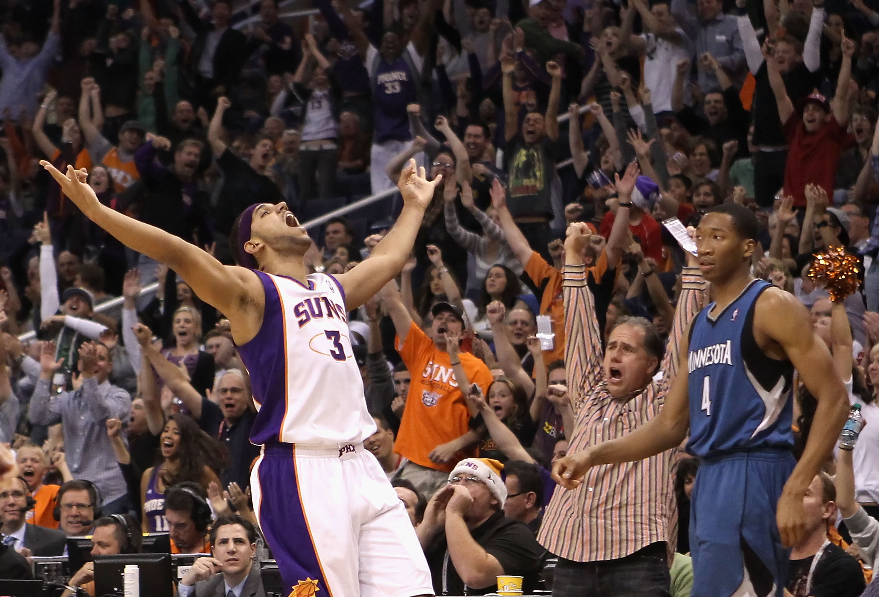 PHOENIX - DECEMBER 15:  Jared Dudley #3 of the Phoenix Suns reacts after hitting a three point shot over Wesley Johnson #4 of the Minnesota Timberwolves during the NBA game at US Airways Center on December 15, 2010 in Phoenix, Arizona. The Suns defeated t
