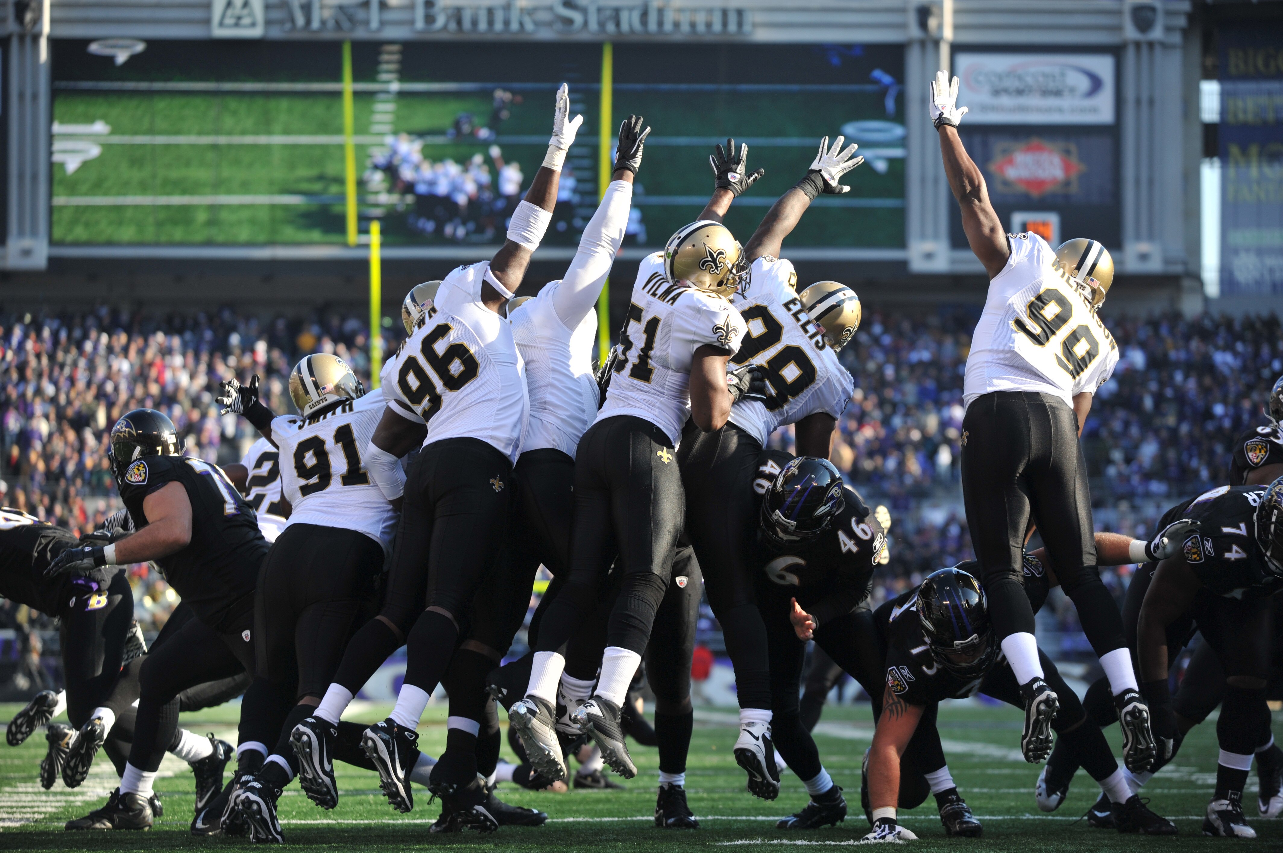 BALTIMORE, MD - DECEMBER 19:  The New Orleans Saints defensive line tries to block a field goal during the game against the Baltimore Ravens  at M&T Bank Stadium on December 19, 2010 in Baltimore, Maryland. The Ravens defeated the Saints 30-24. (Photo by