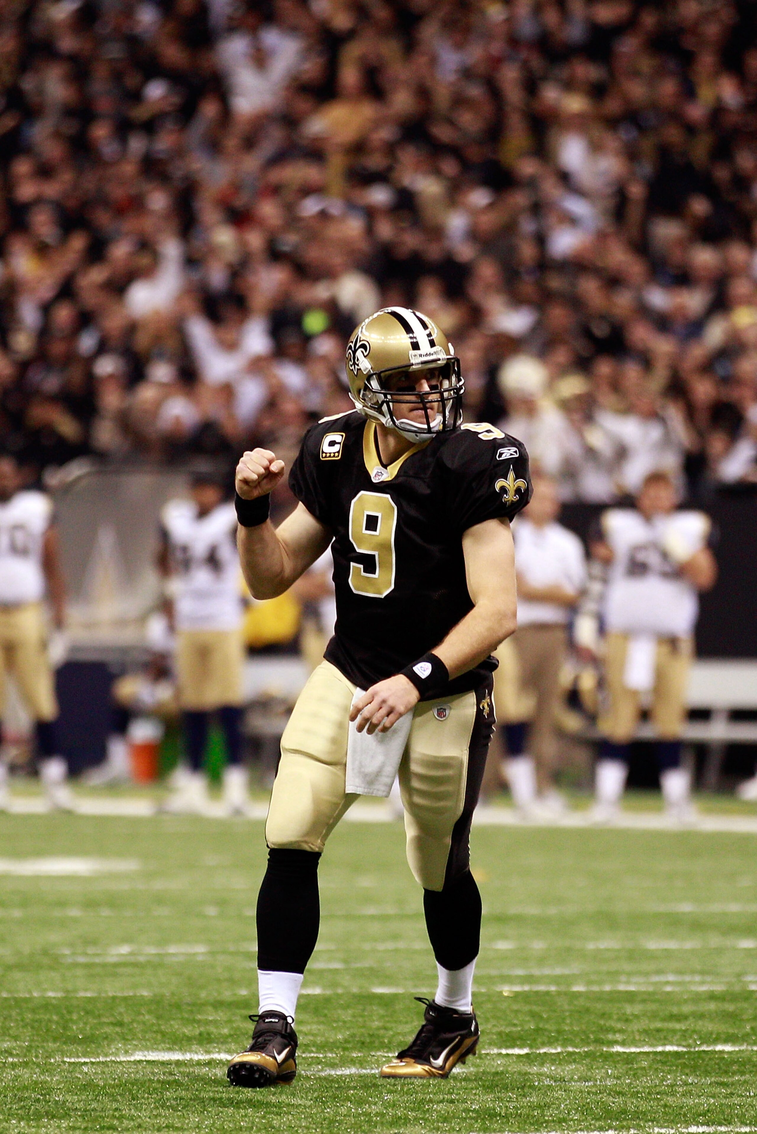 NEW ORLEANS, LA - DECEMBER 12: Drew Brees #9 of the New Orleans Saints celebrates after scoring a touchdown against the St. Louis Rams at the Louisiana Superdome on December 12, 2010 in New Orleans, Louisiana. The Saints defeated the Rams 31-13. (Photo NEW ORLEANS, LA - DECEMBER 12: Drew Brees #9 of the New Orleans Saints celebrates after scoring a touchdown against the St. Louis Rams at the Louisiana Superdome on December 12, 2010 in New Orleans, Louisiana. The Saints defeated the Rams 31-13. (Photo