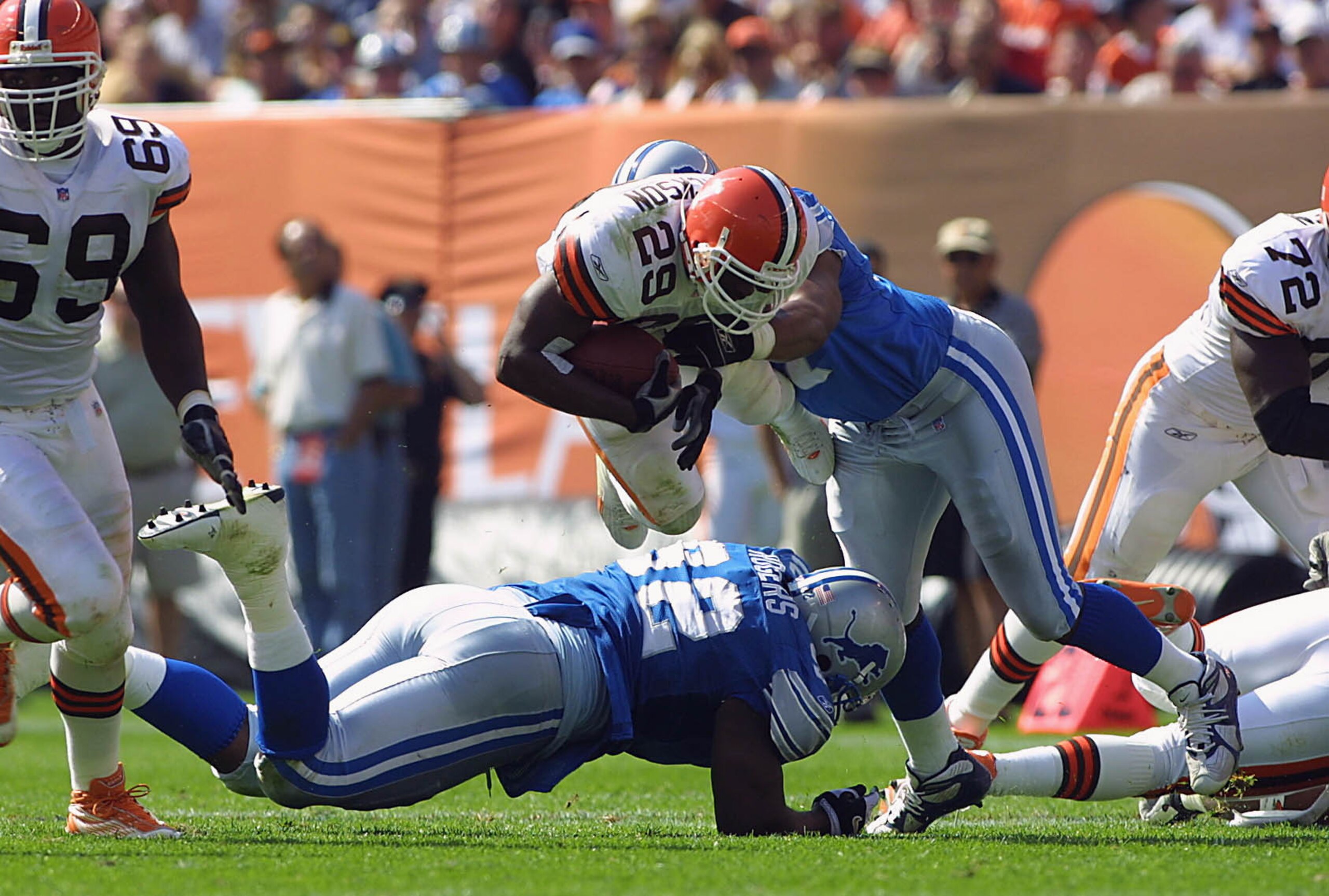 23 Sep 2001:   James Jackson #29 of the Cleveland Browns leaps over Shaun Rogers #92 of the Detroit Lions during the game at Cleveland Browns Stadium in Cleveland, Ohio. The Browns won 24-14. DIGITAL IMAGE. Mandatory Credit: Tom Pidgeon/Allsport
