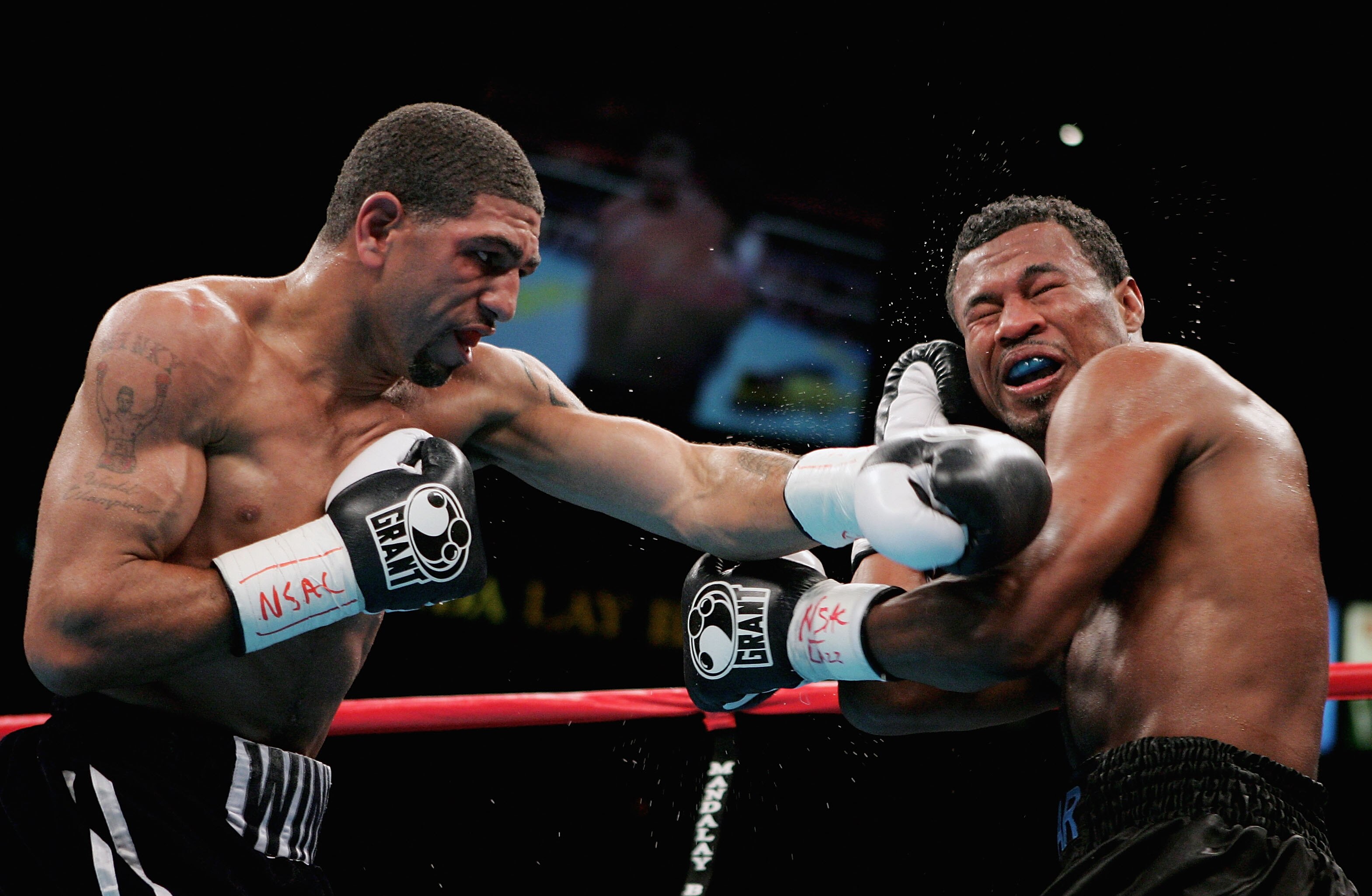 LAS VEGAS - NOVEMBER 20:  Winky Wright lands a left to the face of Shane Mosley during the WBC/WBA Super Welterweight Championship at Mandalay Bay Resort and Casino on November 20, 2004 in Las Vegas, Nevada.  (Photo by Al Bello/Getty Images)
