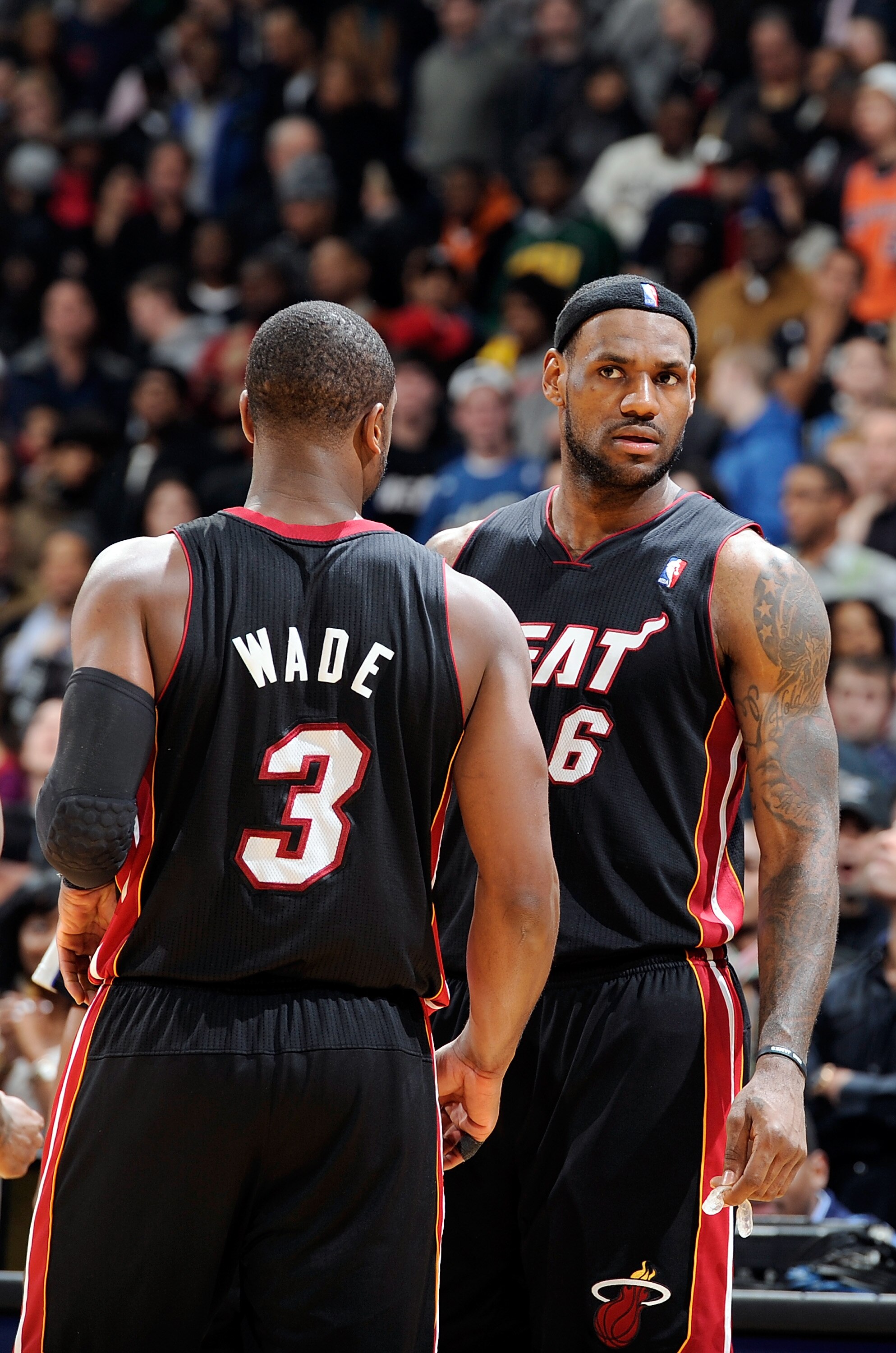 WASHINGTON, DC - DECEMBER 18:  LeBron James #6 of the Miami Heat talks with Dwyane Wade #3 during the game against the Washington Wizards at the Verizon Center on December 18, 2010 in Washington, DC. NOTE TO USER: User expressly acknowledges and agrees th