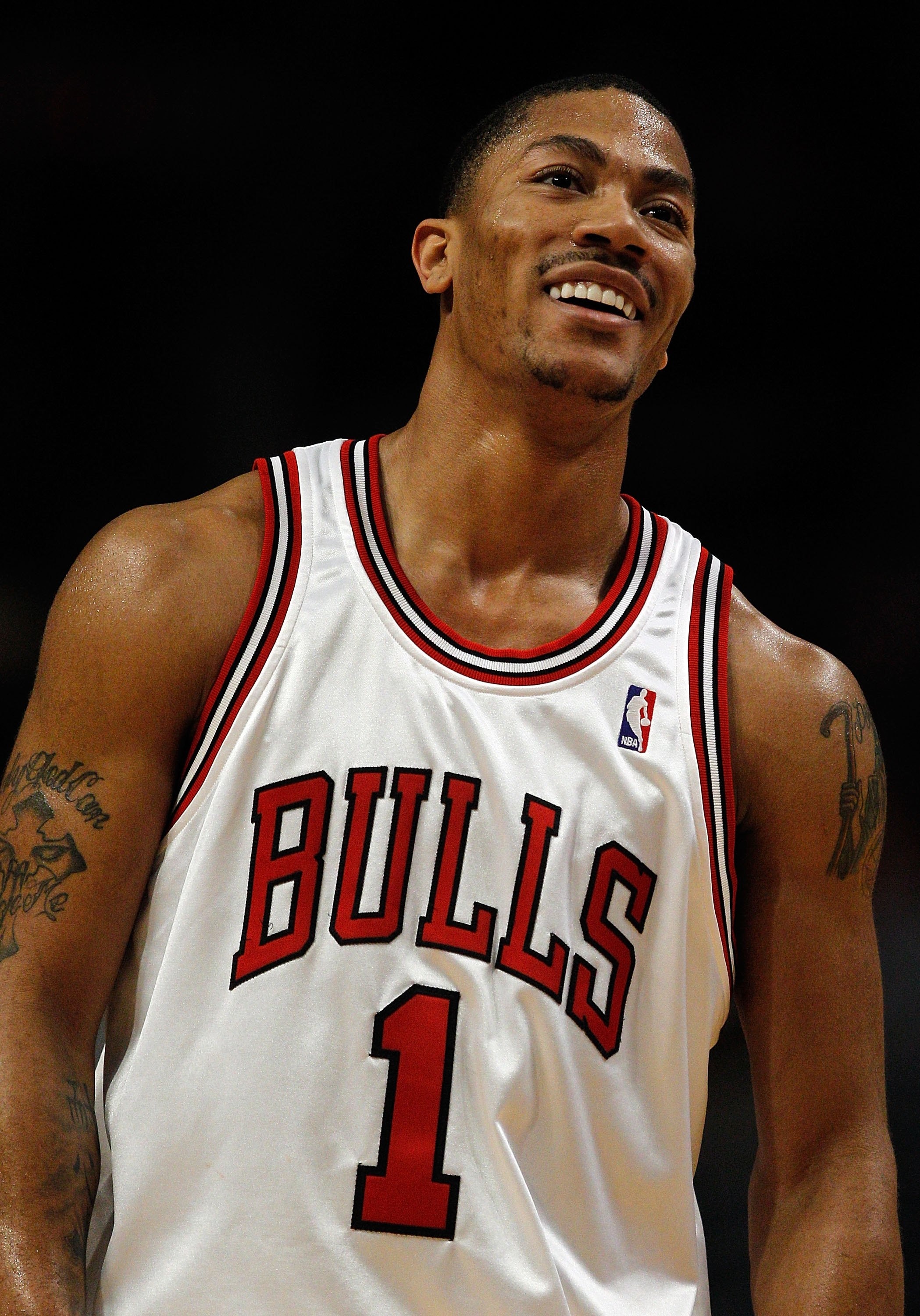 CHICAGO - FEBRUARY 24: Derrick Rose #1 of the Chicago Bulls smiles during a break against the Indiana Pacers at the United Center on February 24, 2010 in Chicago, Illinois. The Bulls defeated the Pacers 120-110. NOTE TO USER: User expressly acknowledges a