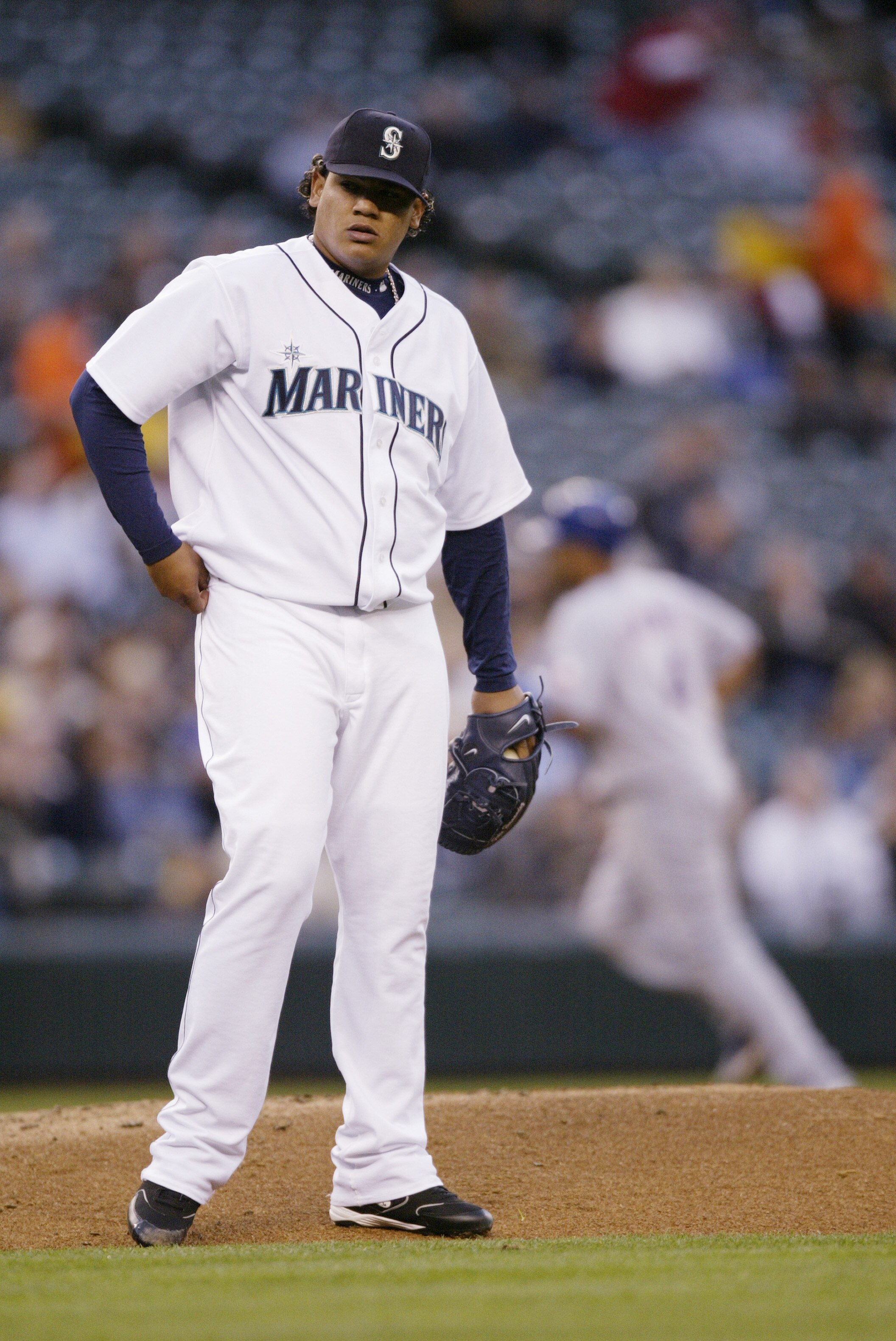 SEATTLE - APRIL 18:  Felix Hernandez #34 of the Seattle Mariners stands on the mound after giving up a home run against the Texas Rangers on April 18, 2006 at Safeco Field in Seattle, Washington. The Rangers defeated the Mariners 7-4.  (Photo by Otto Greu