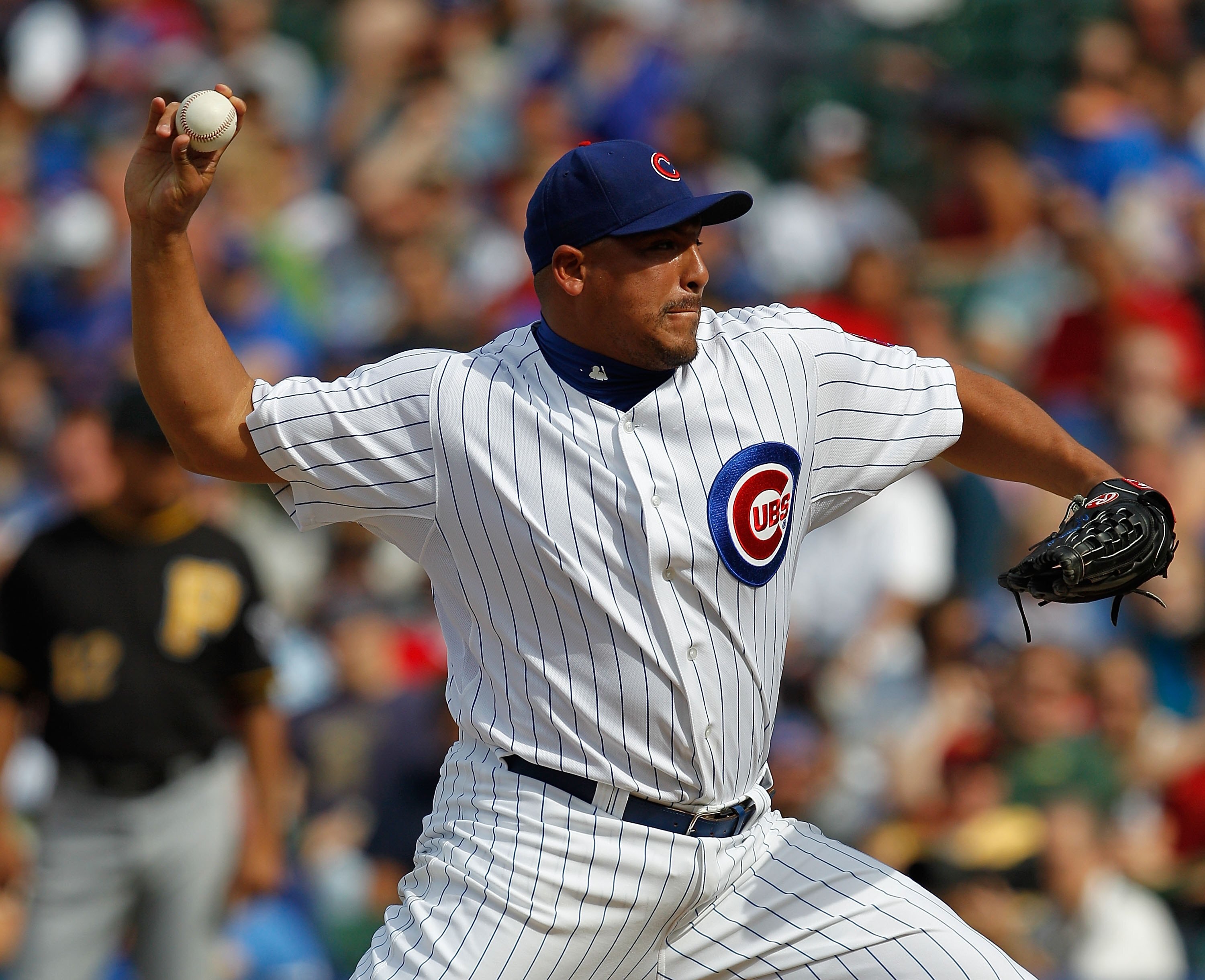 CHICAGO - MAY 14: Carlos Zambrano #38 of the Chicago Cubs pitches against the Pittsburgh Pirates at Wrigley Field on May 14, 2010 in Chicago, Illinois. The Pirates defeated the Cubs 10-6. (Photo by Jonathan Daniel/Getty Images)