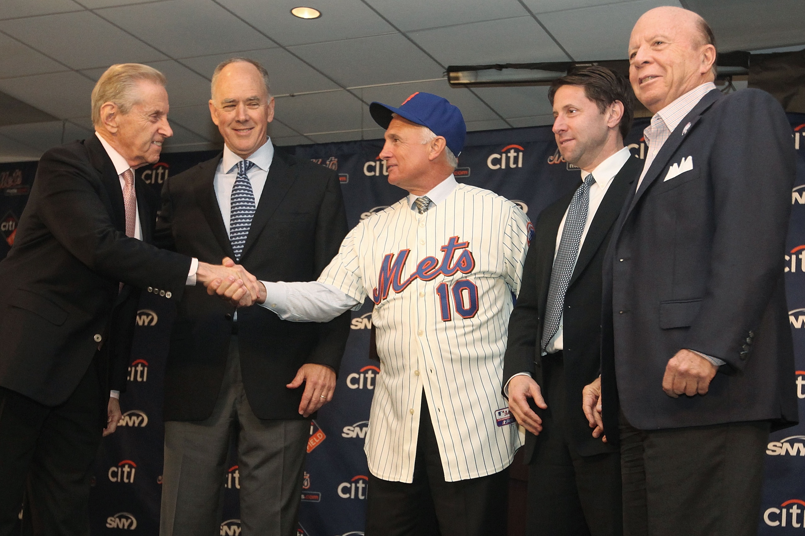 NEW YORK - NOVEMBER 23: Fred Wilpon, General Manager Sandy Alderson, New York Mets new manager Terry Collins, Jeff Wilpon and Saul Katz pose for pictures during a press conference at Citi Field on November 23, 2010 in the Flushing neighborhood, of the Q NEW YORK - NOVEMBER 23: Fred Wilpon, General Manager Sandy Alderson, New York Mets new manager Terry Collins, Jeff Wilpon and Saul Katz pose for pictures during a press conference at Citi Field on November 23, 2010 in the Flushing neighborhood, of the Q