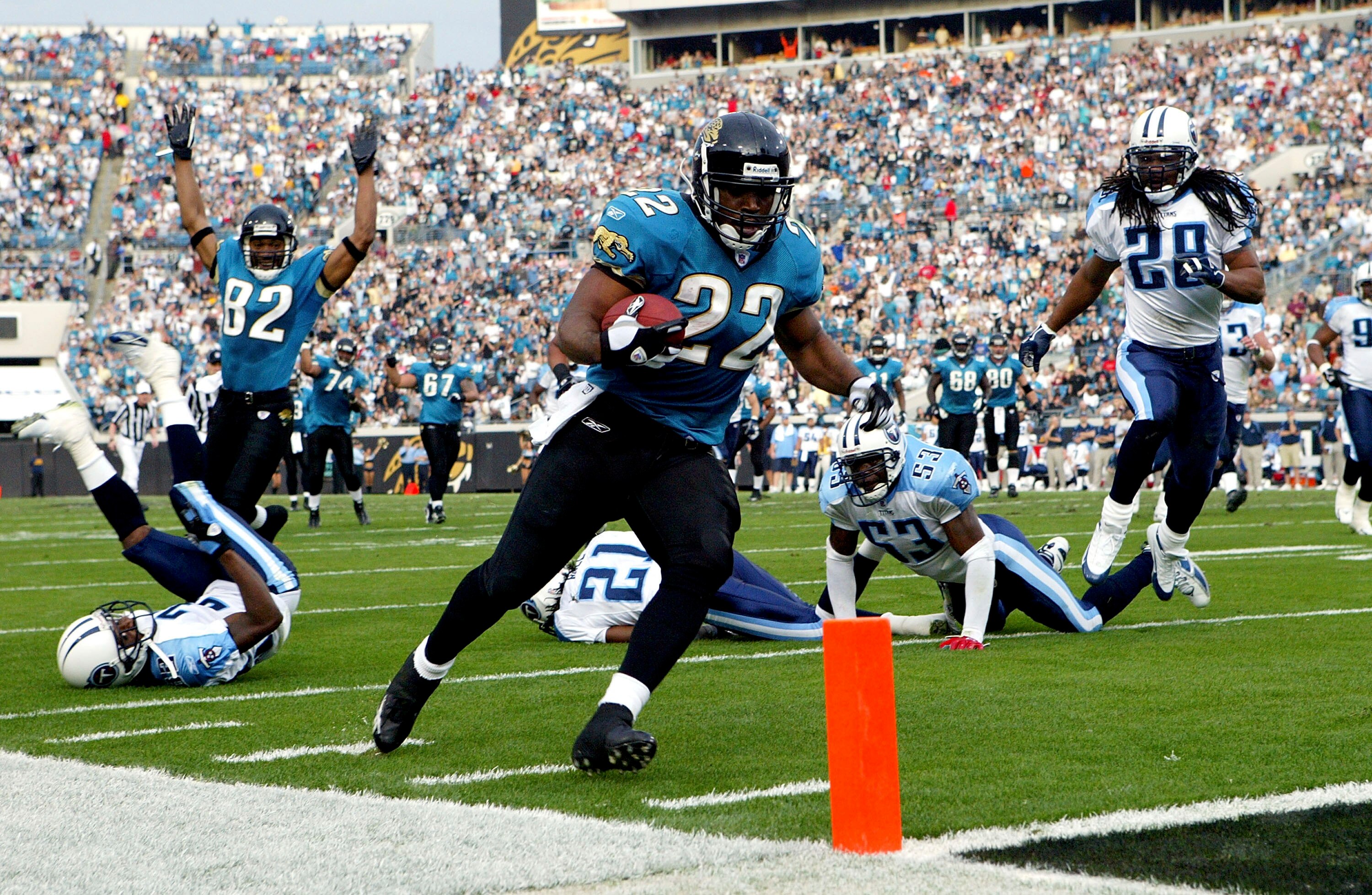 JACKSONVILLE, FL - JANUARY 1:  Running back LaBrandon Toefield #22 of the Jacksonville Jaguars scores a touchdown in the first quarter against the Tennessee Titans at Alltel Stadium on January 1, 2006 in Jacksonville, Florida. (Photo by Doug Benc/Getty Im