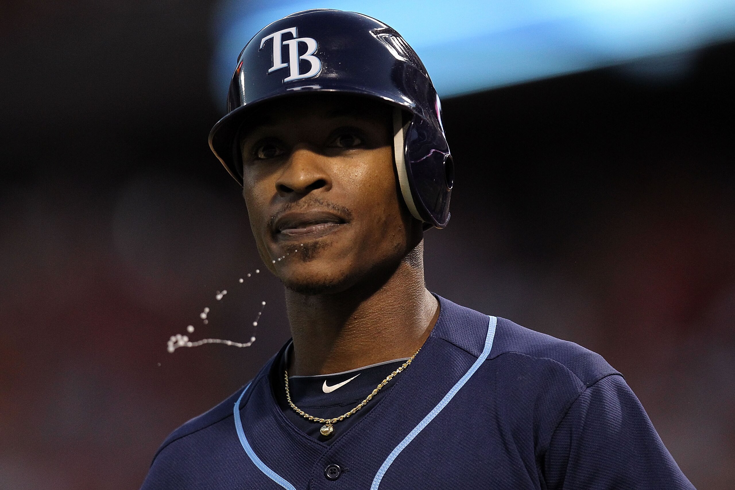 ARLINGTON, TX - OCTOBER 09: B.J. Upton #2 of the Tampa Bay Rays spits after a strikout against the Texas Rangers during game 3 of the ALDS at Rangers Ballpark in Arlington on October 9, 2010 in Arlington, Texas. (Photo by Ronald Martinez/Getty Images) ARLINGTON, TX - OCTOBER 09: B.J. Upton #2 of the Tampa Bay Rays spits after a strikout against the Texas Rangers during game 3 of the ALDS at Rangers Ballpark in Arlington on October 9, 2010 in Arlington, Texas. (Photo by Ronald Martinez/Getty Images)