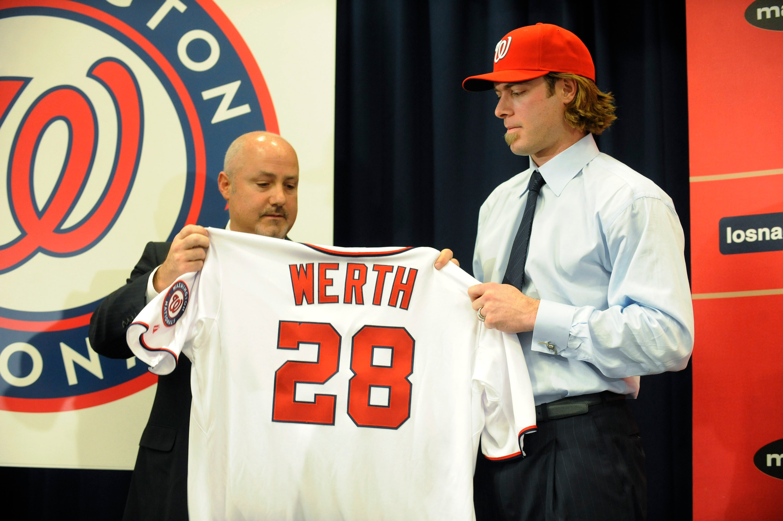 WASHINGTON, DC - DECEMBER 15: Executive Vice President of Baseball Operations and General Manager Mike Rizzo (L) introduces Jayson Werth #28 to the media on December 15, 2010 at Nationals Park in Washington, DC. (Photo by Mitchell Layton/Getty Images) WASHINGTON, DC - DECEMBER 15: Executive Vice President of Baseball Operations and General Manager Mike Rizzo (L) introduces Jayson Werth #28 to the media on December 15, 2010 at Nationals Park in Washington, DC. (Photo by Mitchell Layton/Getty Images)