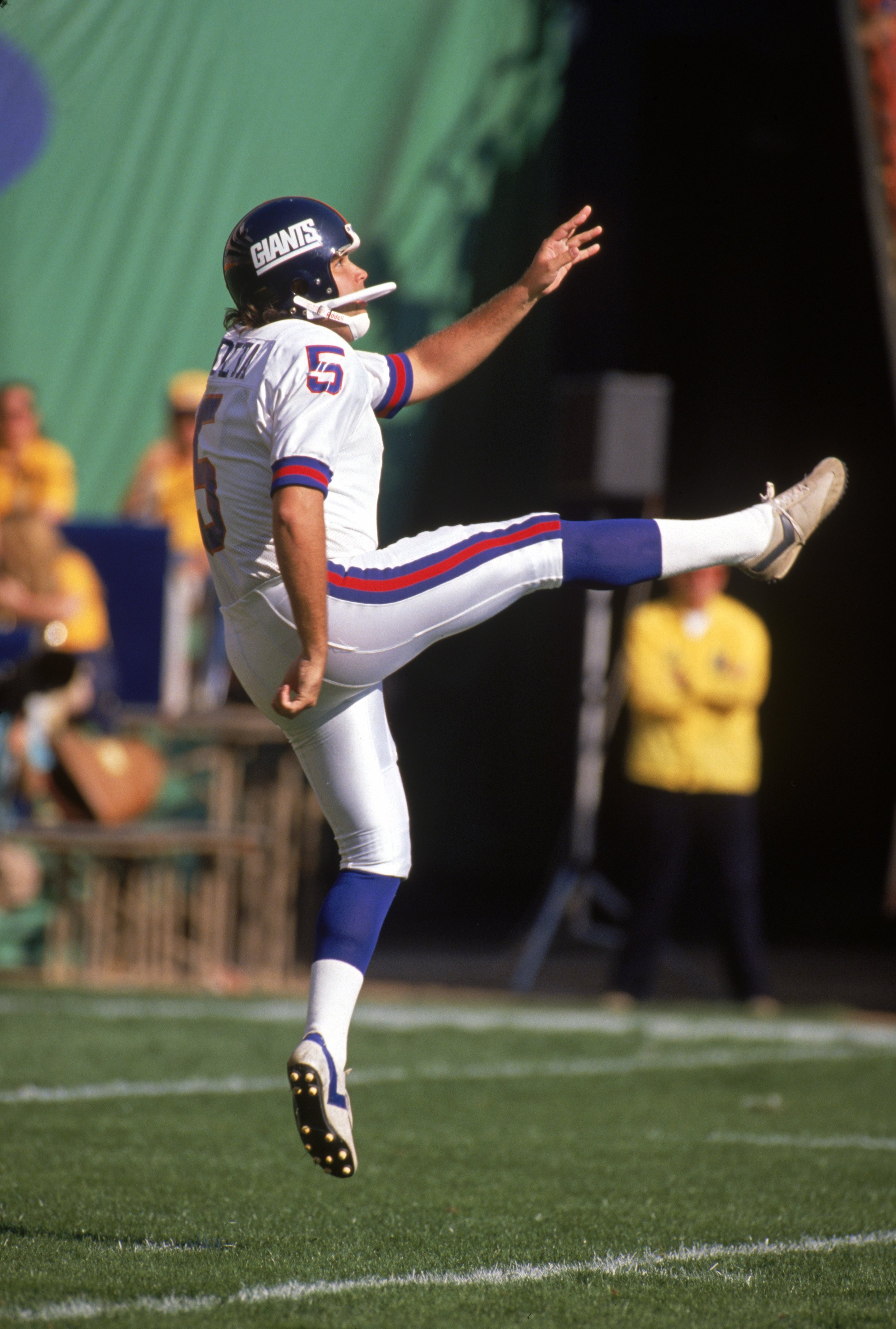 ANAHEIM, CA - NOVEMBER 12:  Punter Sean Landeta #5 of the New York Giants kicks the ball away during a game against the Los Angeles Rams at Anaheim Stadium on November 12, 1989 in Anaheim, California.  The Rams won 31-10.  (Photo by George Rose/Getty Imag
