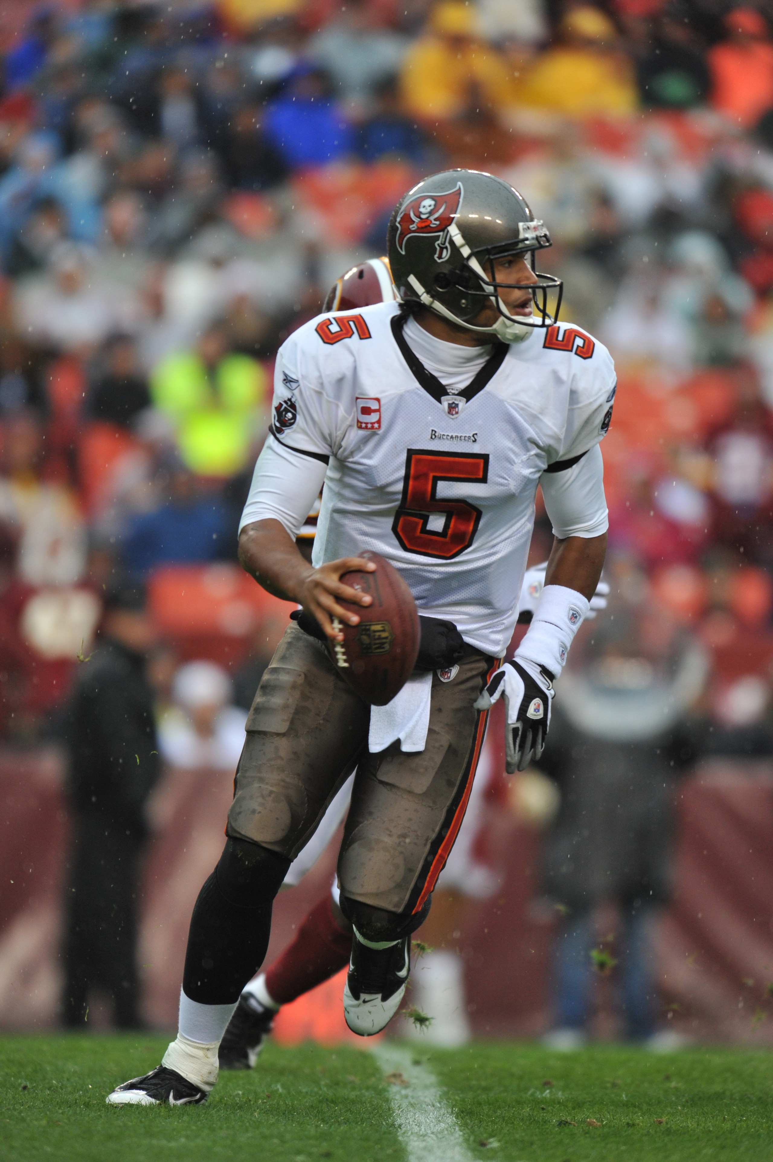 LANDOVER, MD - DECEMBER 12: Josh Freeman #5 of the Tampa Bay Buccaneers scrambles during the game against the Washington Redskins at FedExField on December 12, 2010 in Landover, Maryland. The Buccaneers defeated the Redskins 17-16. (Photo by Larry Frenc LANDOVER, MD - DECEMBER 12: Josh Freeman #5 of the Tampa Bay Buccaneers scrambles during the game against the Washington Redskins at FedExField on December 12, 2010 in Landover, Maryland. The Buccaneers defeated the Redskins 17-16. (Photo by Larry Frenc