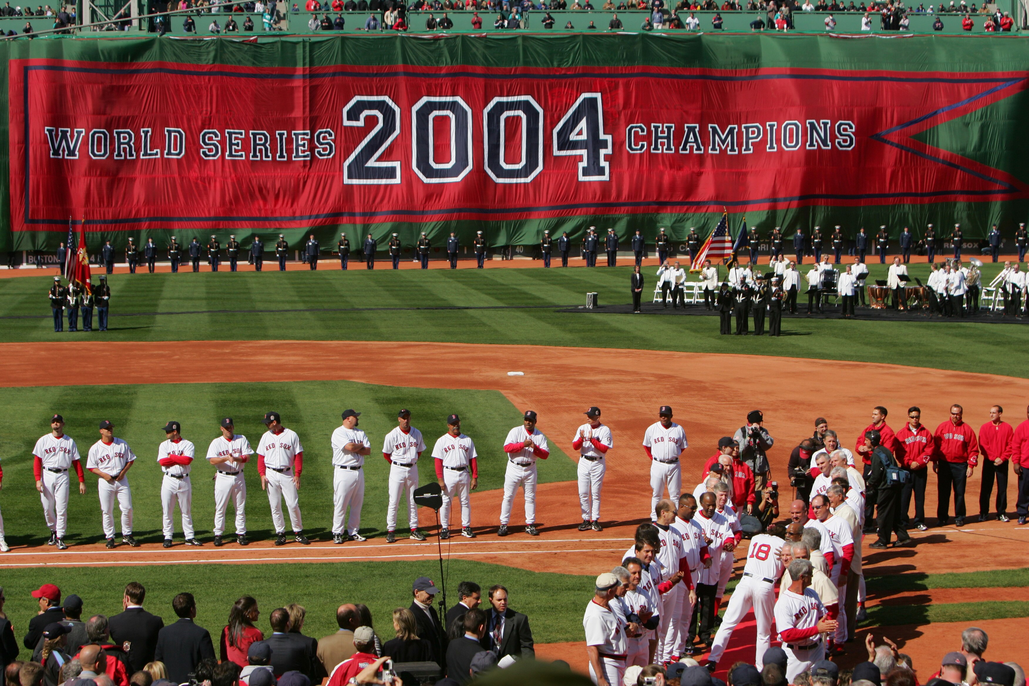 BOSTON - APRIL 11:  The Boston Red Sox celebrate their 2004 World Series Championship during a pre-game ceremony prior to the game against the New York Yankees at Fenway Park on April 11, 2005 in Boston, Massachusetts. The Red Sox won 8-1.  (Photo by Ezra
