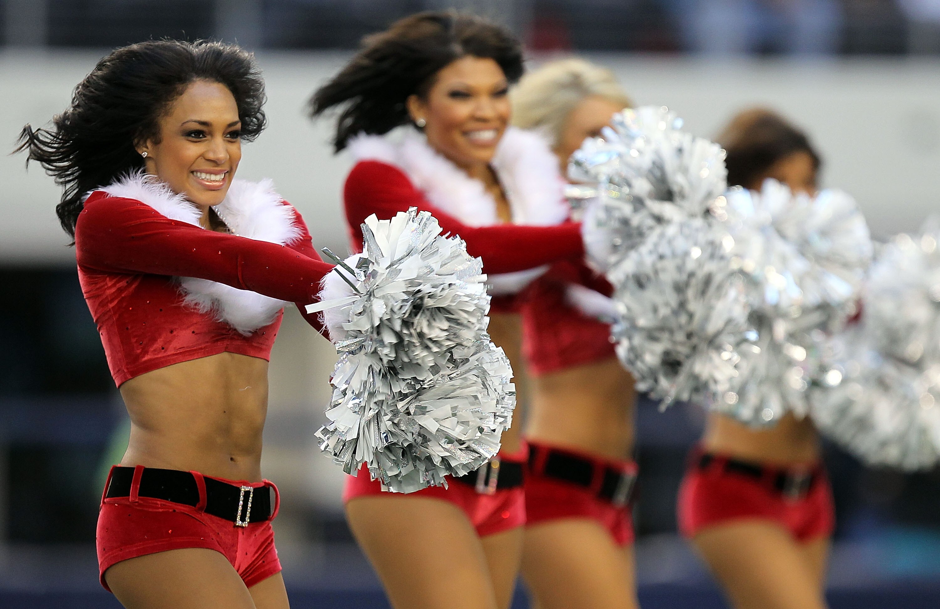 ARLINGTON, TX - DECEMBER 19:  A Dallas Cowboys Cheerleader performs at Cowboys Stadium on December 19, 2010 in Arlington, Texas.  (Photo by Ronald Martinez/Getty Images)