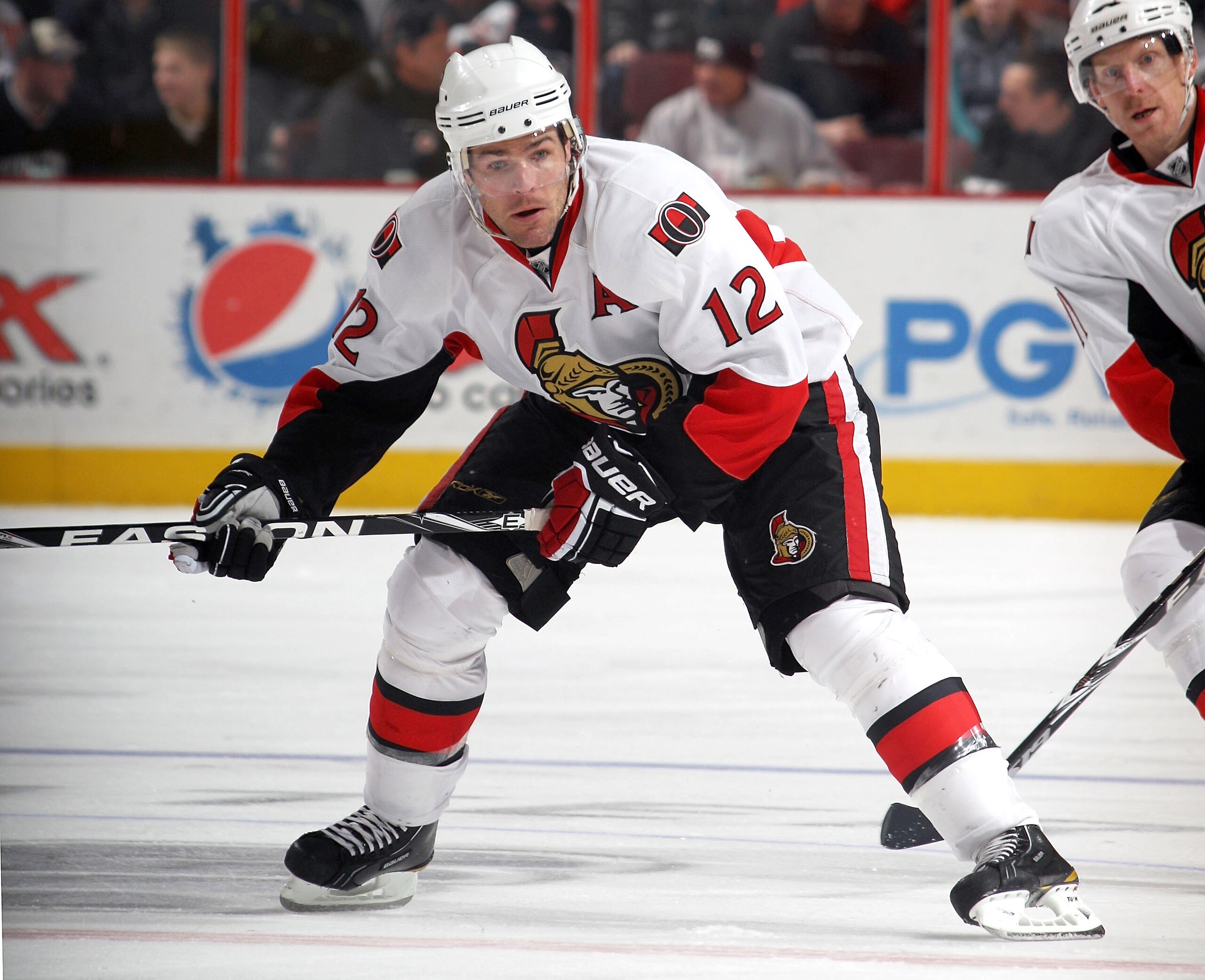 PHILADELPHIA - NOVEMBER 15: Mike Fisher #12 of the Ottawa Senators skates against the Philadelphia Flyers at the Wells Fargo Center on November 15, 2010 in Philadelphia, Pennsylvania. (Photo by Bruce Bennett/Getty Images) PHILADELPHIA - NOVEMBER 15: Mike Fisher #12 of the Ottawa Senators skates against the Philadelphia Flyers at the Wells Fargo Center on November 15, 2010 in Philadelphia, Pennsylvania. (Photo by Bruce Bennett/Getty Images)