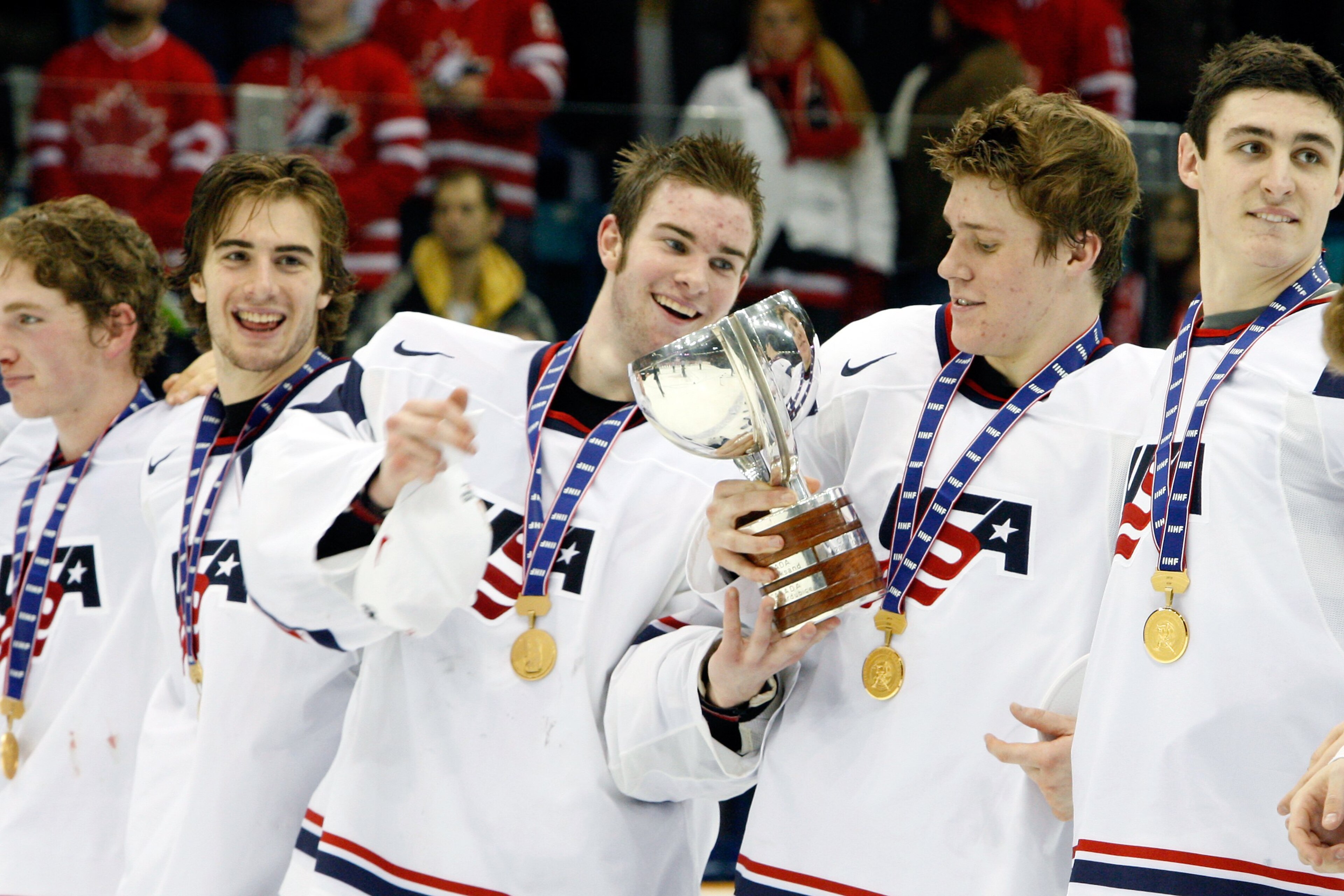 SASKATOON, SK - JANUARY 5:  Jack Campbell #1 of Team USA passes the 2010 IIHF Champions Cup to Jake Gardiner #28 of Team USA during the 2010 IIHF World Junior Championship Tournament Gold Medal game on January 5, 2010 at the Credit Union Centre in Saskato