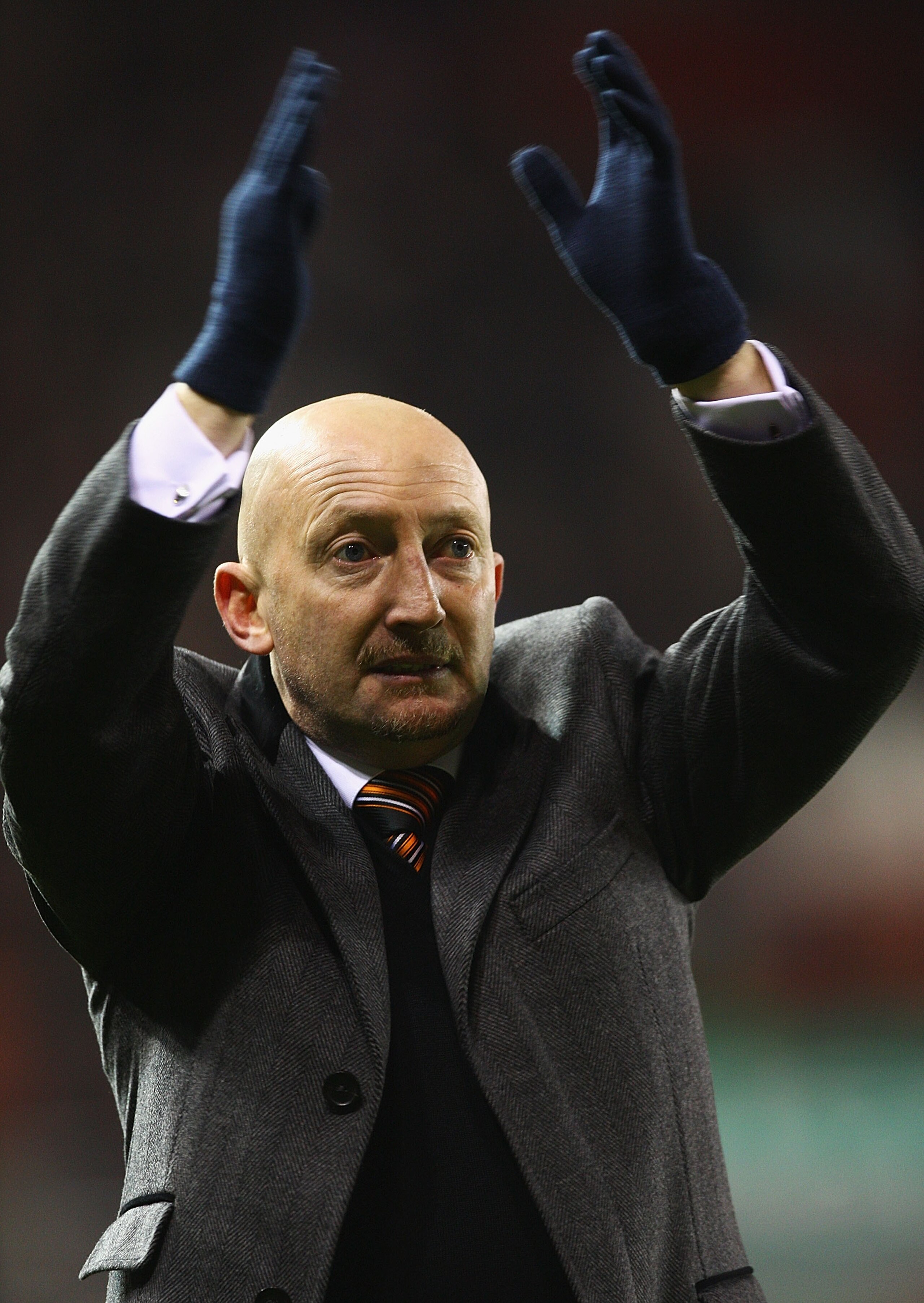 STOKE ON TRENT, ENGLAND - DECEMBER 11:  Ian Holloway, manager of Blackpool thanks the supporters during the Barclays Premier League match between Stoke City and Blackpool at Britannia Stadium on December 11, 2010 in Stoke on Trent, England.  (Photo by Mat