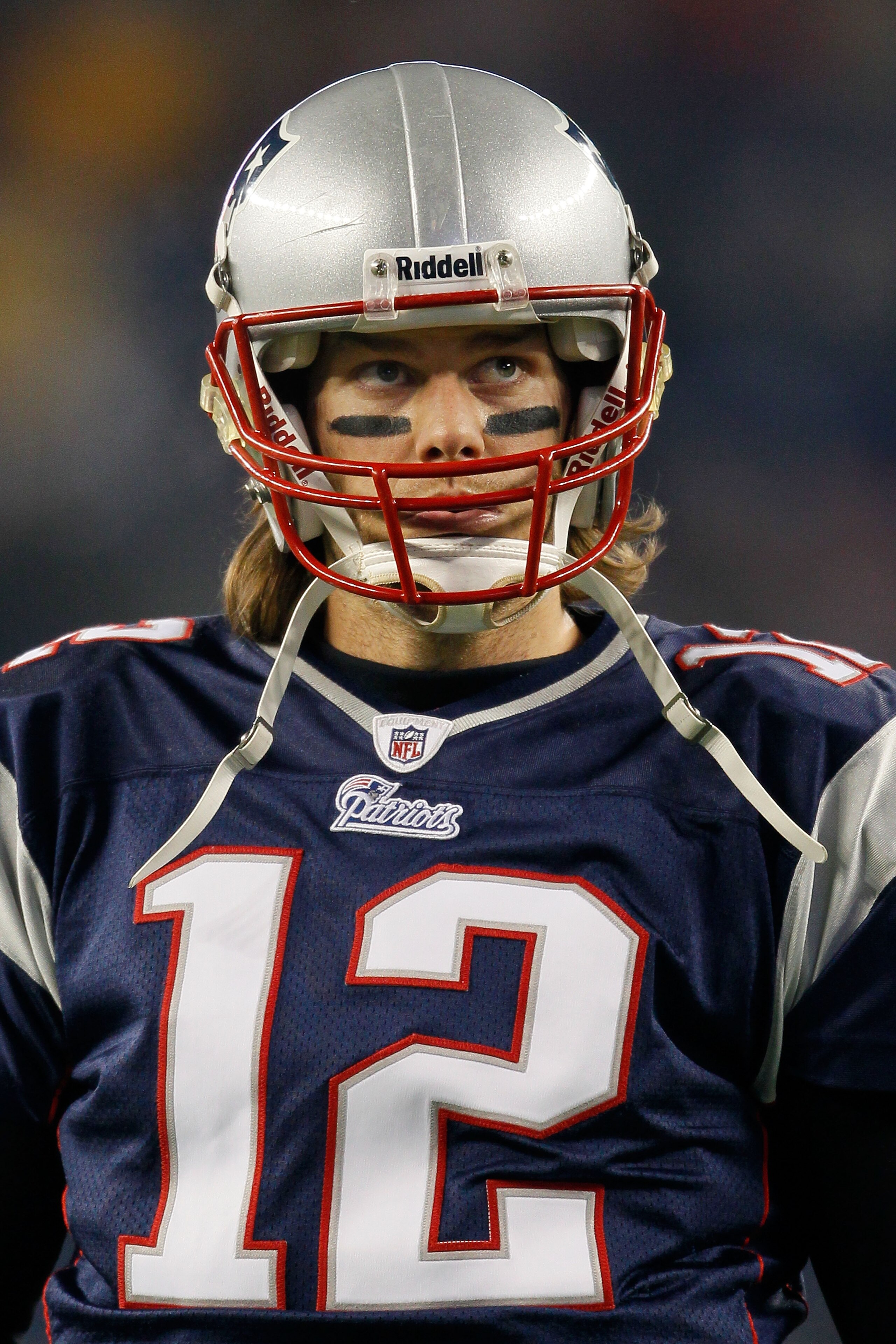 FOXBORO, MA - DECEMBER 19: Quarterback Tom Brady #12 of the New England Patriots looks on before the game against the Green Bay Packers at Gillette Stadium on December 19, 2010 in Foxboro, Massachusetts. The Patriots won the game 31-27. (Photo by Jim Ro FOXBORO, MA - DECEMBER 19: Quarterback Tom Brady #12 of the New England Patriots looks on before the game against the Green Bay Packers at Gillette Stadium on December 19, 2010 in Foxboro, Massachusetts. The Patriots won the game 31-27. (Photo by Jim Ro