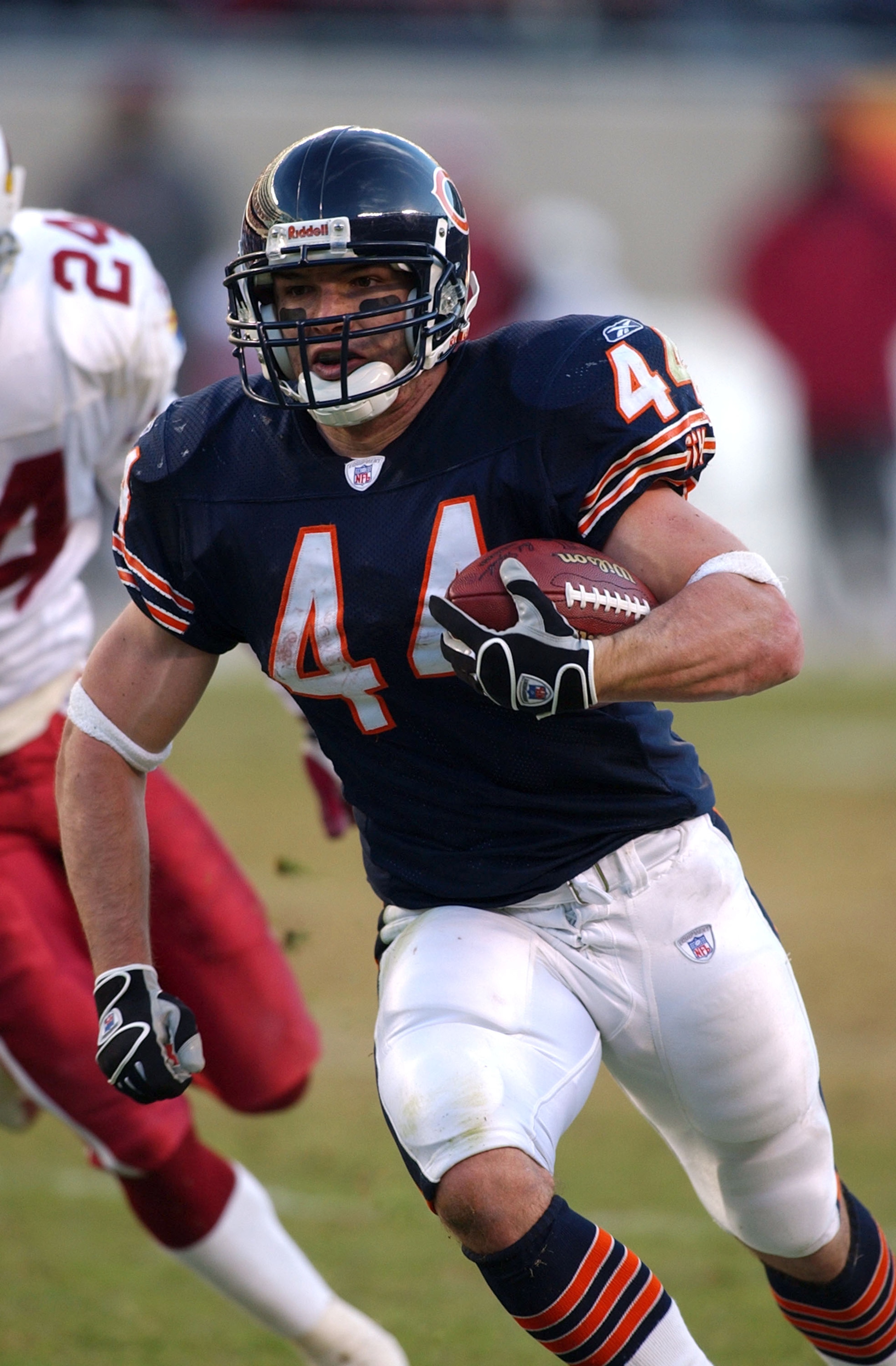 CHICAGO - NOVEMBER 30:  Running back Brock Forsey #44 of the Chicago Bears runs around end for a touchdwon late in a game against the Arizona Cardinals on November 30, 2003 at Soldier Field in Chicago, Illinois. The Bears defeated the Cardinals 28-3.  (Ph