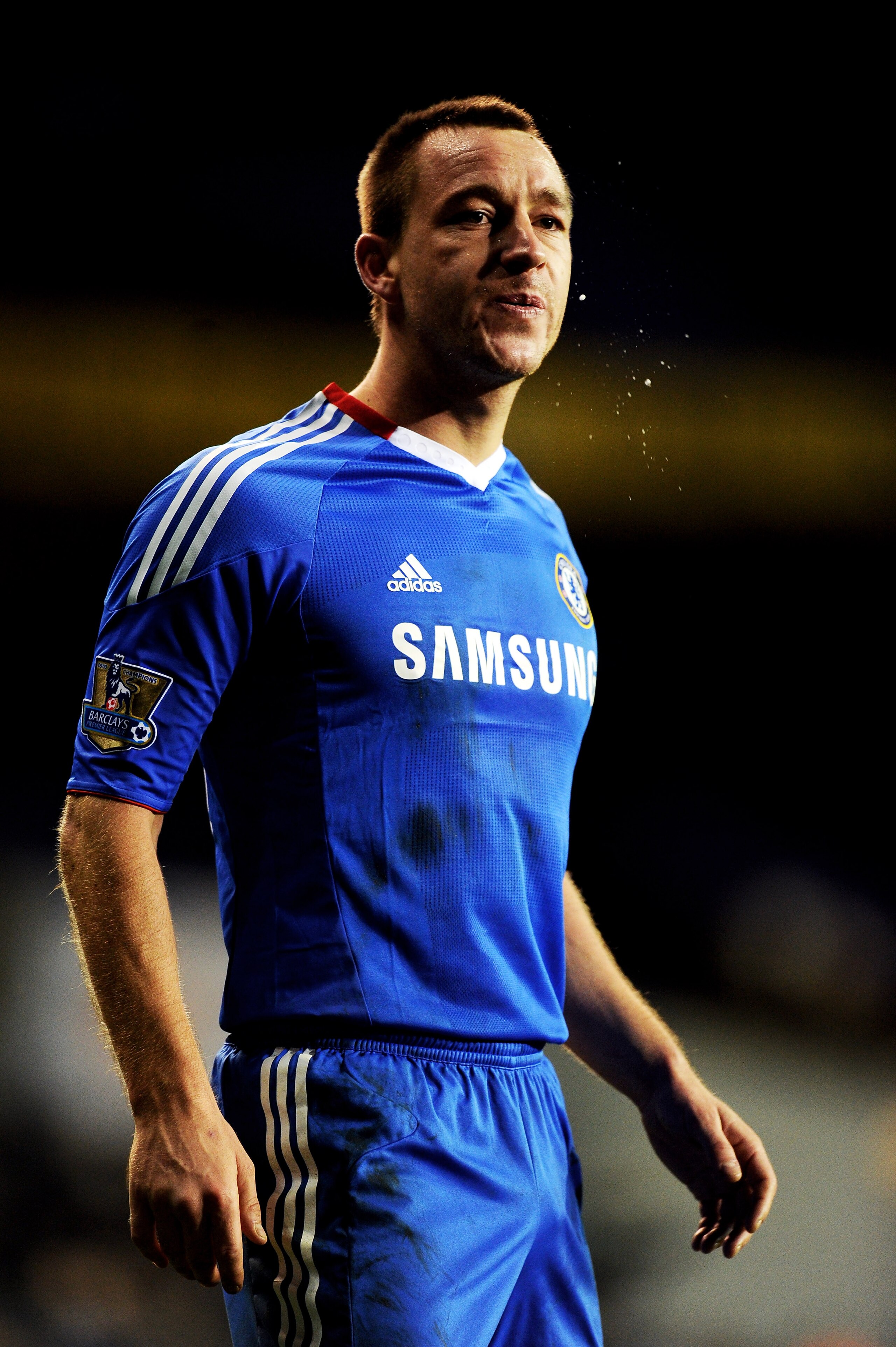 LONDON, ENGLAND - DECEMBER 12: John Terry of Chelsea reacts after being taunted by the Tottenham fans following the final whistle during the Barclays Premier League match between Tottenham Hotspur and Chelsea at White Hart Lane on December 12, 2010 in Lon