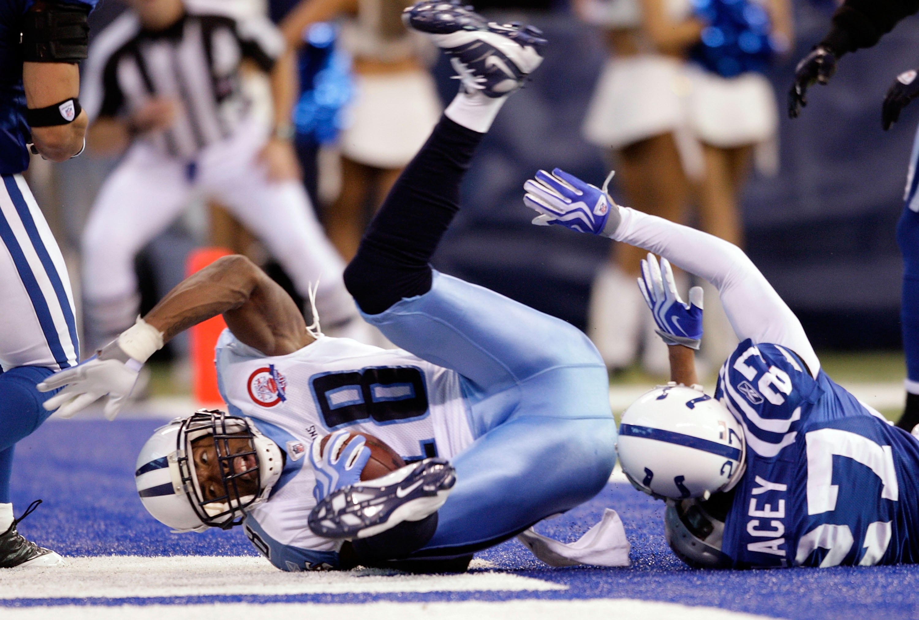 INDIANAPOLIS - DECEMBER 06: Kenny Britt #18 of  the Tennessee Titans scores a touchdown during the NFL game against the Indianapolis Colts at Lucas Oil Stadium on December 6, 2009 in Indianapolis, Indiana.  (Photo by Andy Lyons/Getty Images)