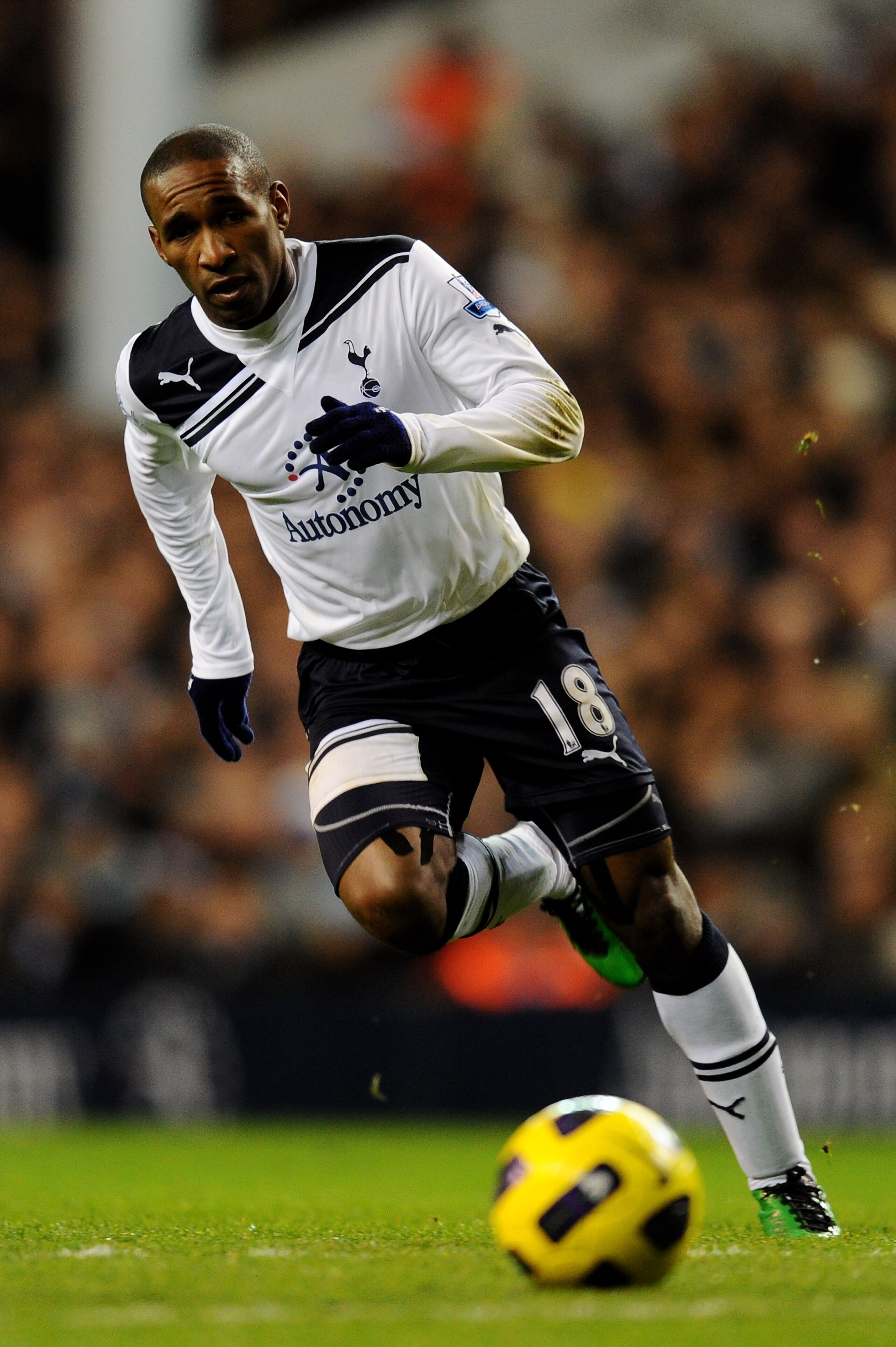 LONDON, ENGLAND - DECEMBER 12: Jermain Defoe of Spurs runs with the ball during the Barclays Premier League match between Tottenham Hotspur and Chelsea at White Hart Lane on December 12, 2010 in London, England. (Photo by Mike Hewitt/Getty Images)