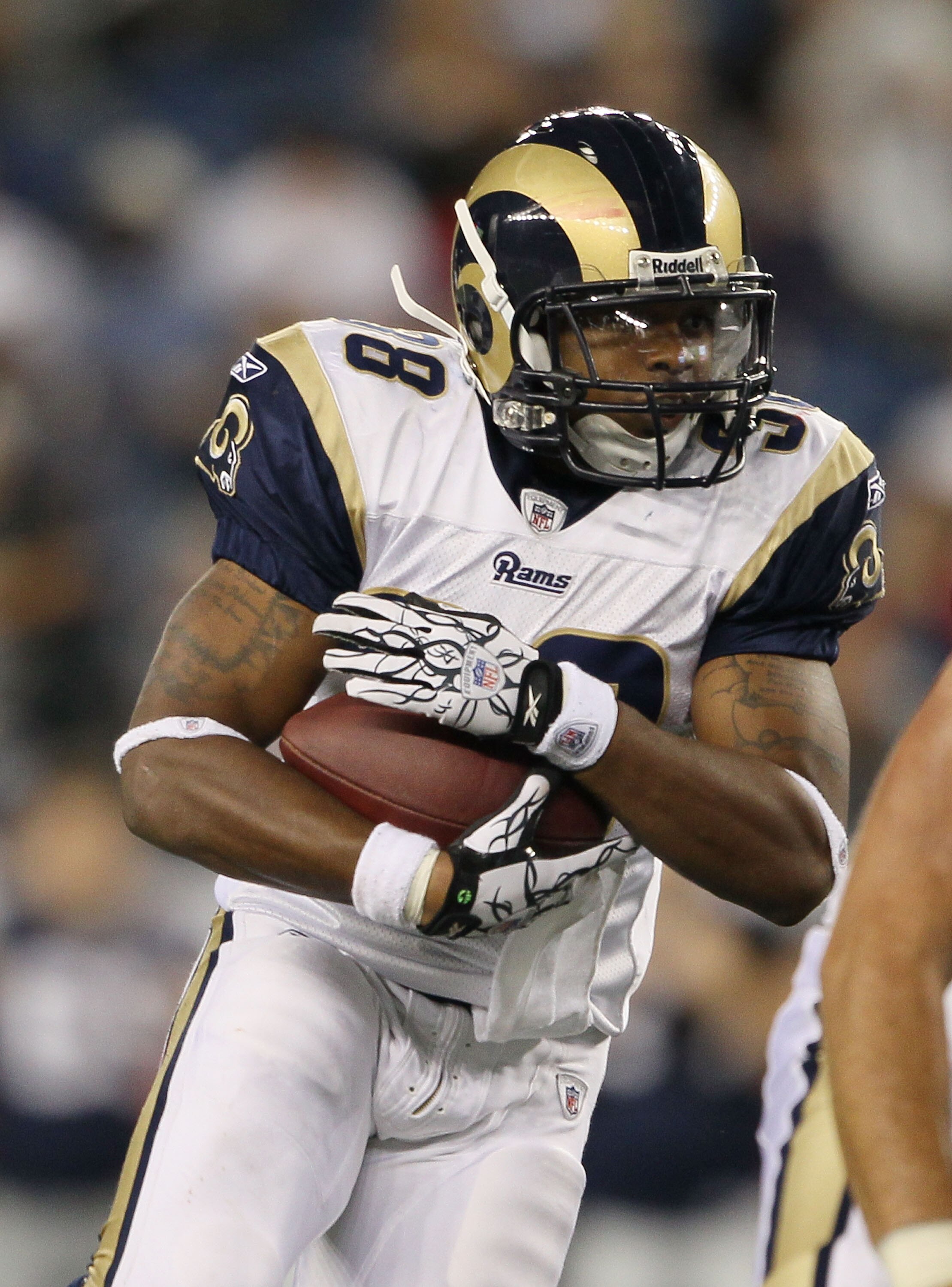 FOXBORO, MA - AUGUST 26:  Keith Toston #38 of the St. Louis Rams carries the ball in the second half against the New England Patriots on August 26, 2010 at Gillette Stadium in Foxboro, Massachusetts. The Rams defeated the Patriots 36-35.  (Photo by Elsa/G