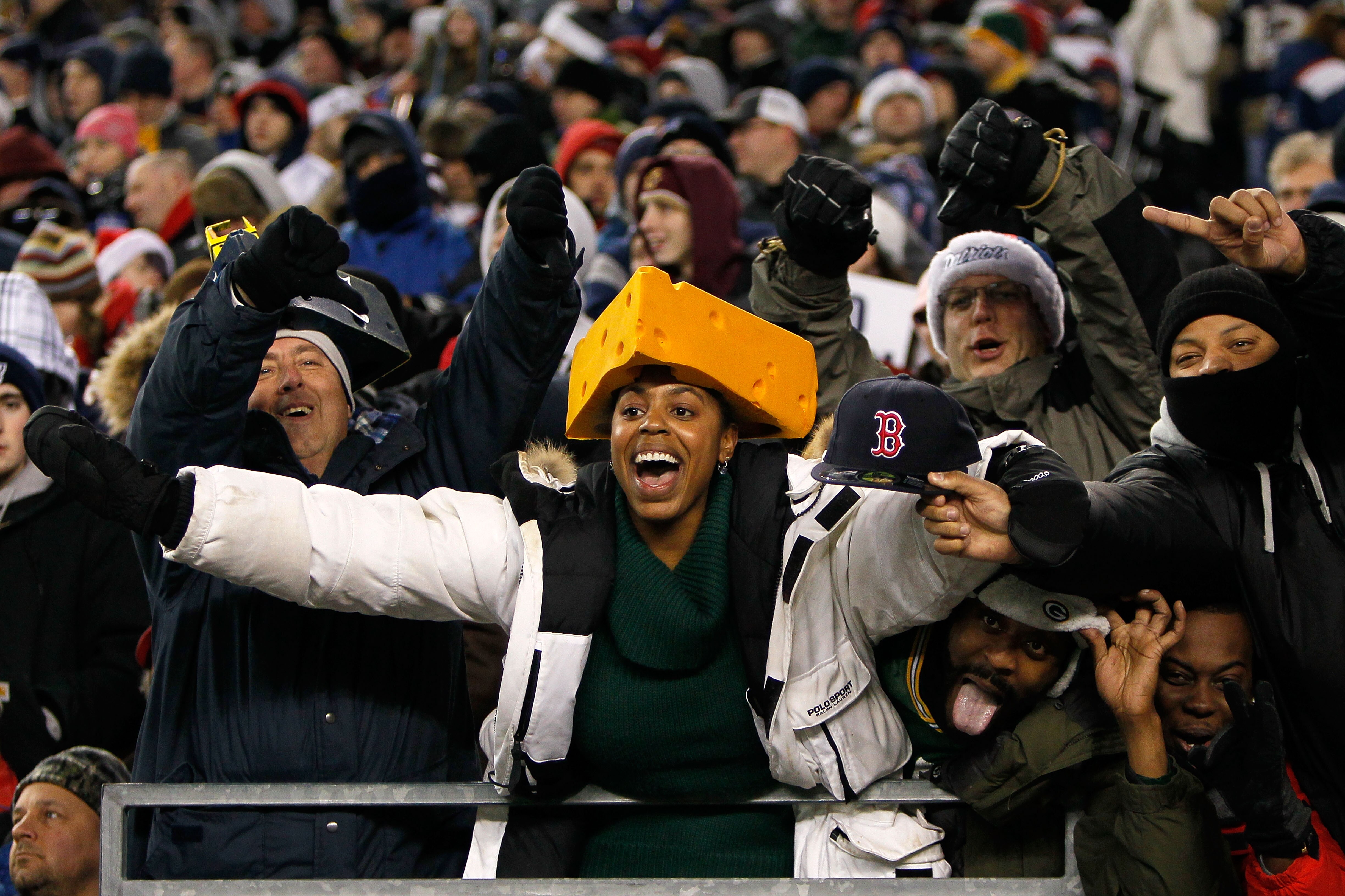 FOXBORO, MA - DECEMBER 19:  A fan of the Green Bay Packers cheers during the fourth quarter of the game against the New England Patriots at Gillette Stadium on December 19, 2010 in Foxboro, Massachusetts. The Patriots won the game 31-27.  (Photo by Jim Ro