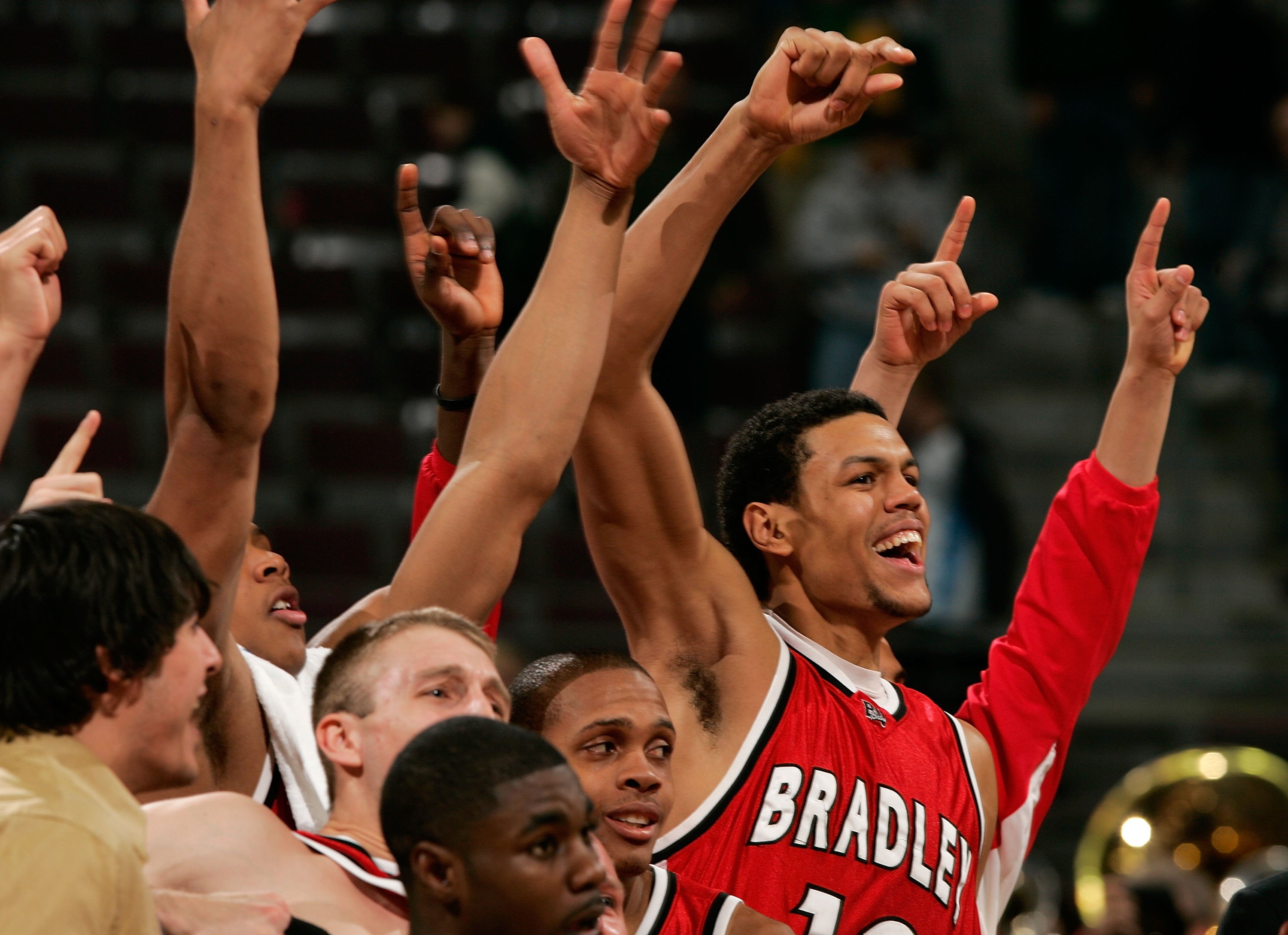 AUBURN HILLS, MI - MARCH 17:  Patrick O'Bryant #13 of the Bradley Braves and teammates celebrate the 77-73 upset win over the Kansas Jayhawks during the First Round of the 2006 NCAA Men's Basketball Tournament at The Palace of Auburn Hills on March 17, 20