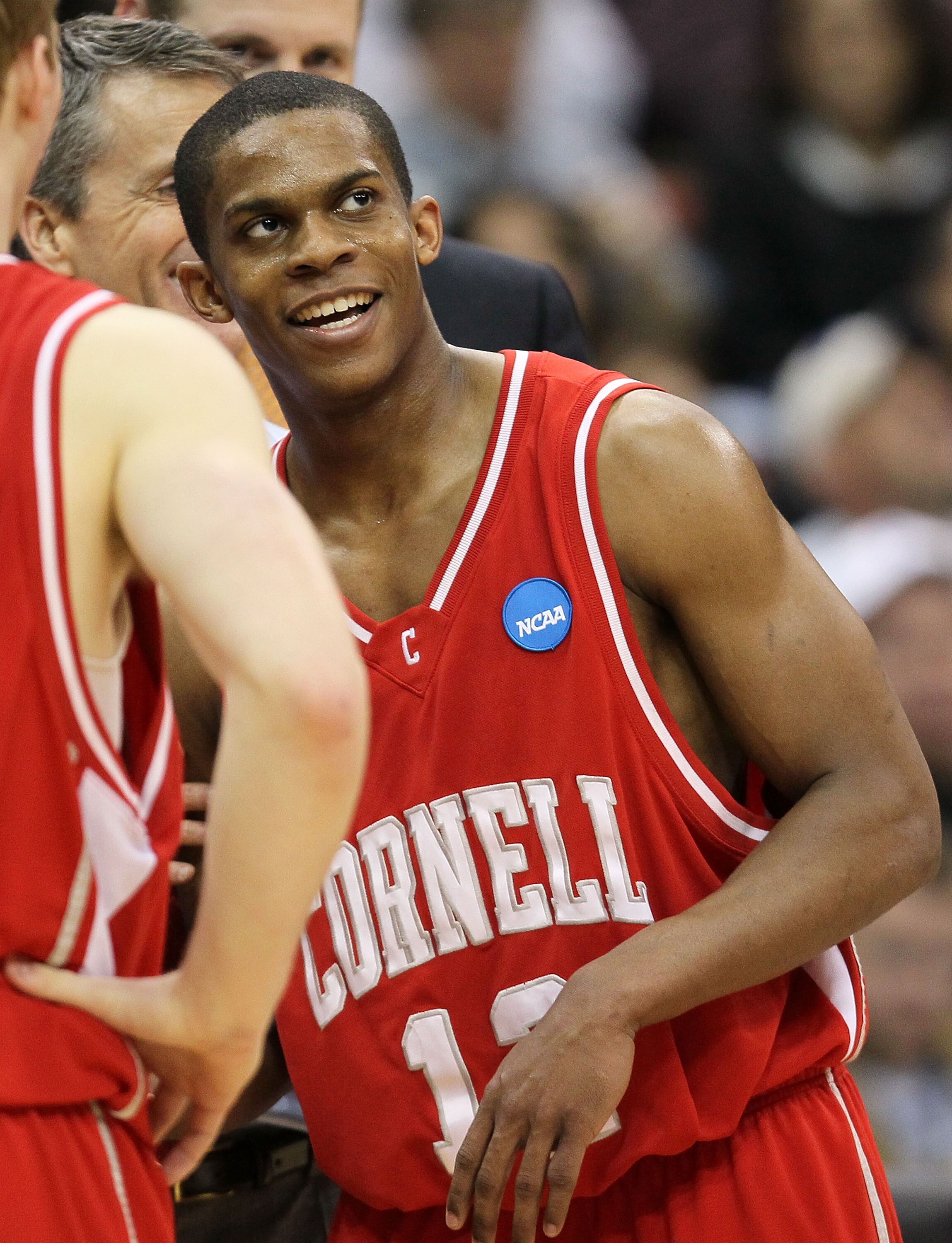 JACKSONVILLE, FL - MARCH 21:  Louis Dale #12 of the Cornell Big Red celebrates after defeating the Wisconsin Badgers during the second round of the 2010 NCAA men's basketball tournament at Jacksonville Veteran's Memorial Arena on March 21, 2010 in Jackson